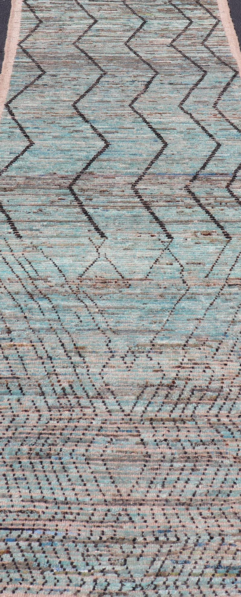 Modern Casual Runner in Wool with Sub-Geometric Modern Design in Teal & Charcoal. Keivan Woven Arts; rug SNK-2408, country of origin / type: Afghanistan / Modern Casual, circa Early-21th Century.
Measures: 3'4 x 9'10 
This modern casual tribal