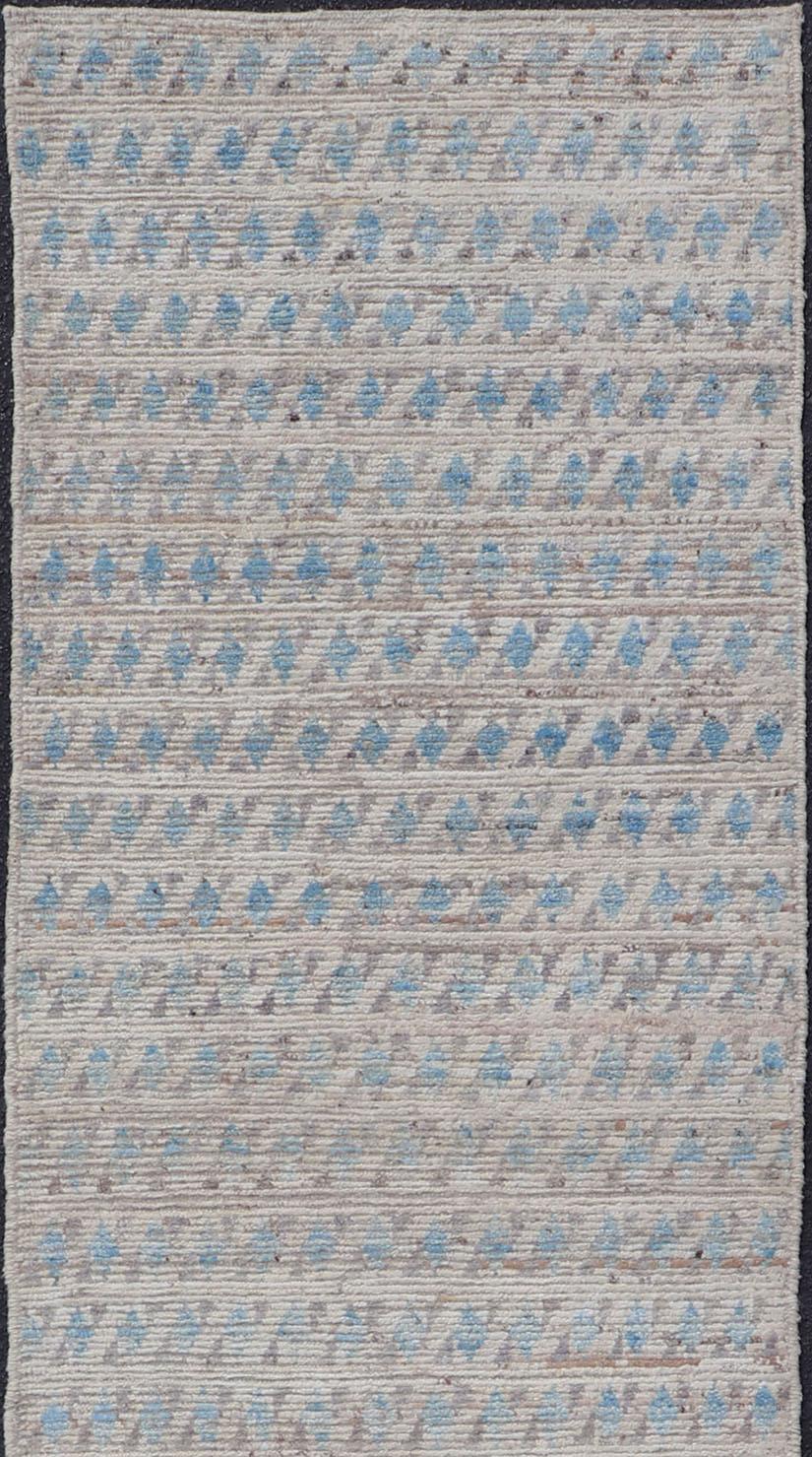 Modern piled rug with all-over tribal design in blue, rug AFG-32073, country of origin / type: Afghanistan / Piled, condition: new

This brand new rug features a modern tribal all-over design and a combination of tribal and modern. The color
