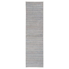 Runner dal design tribale moderno e casual nei colori crema, grigio e blu