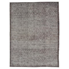Tappeto moderno e disinvolto con design marocchino in grigio e crema variegato