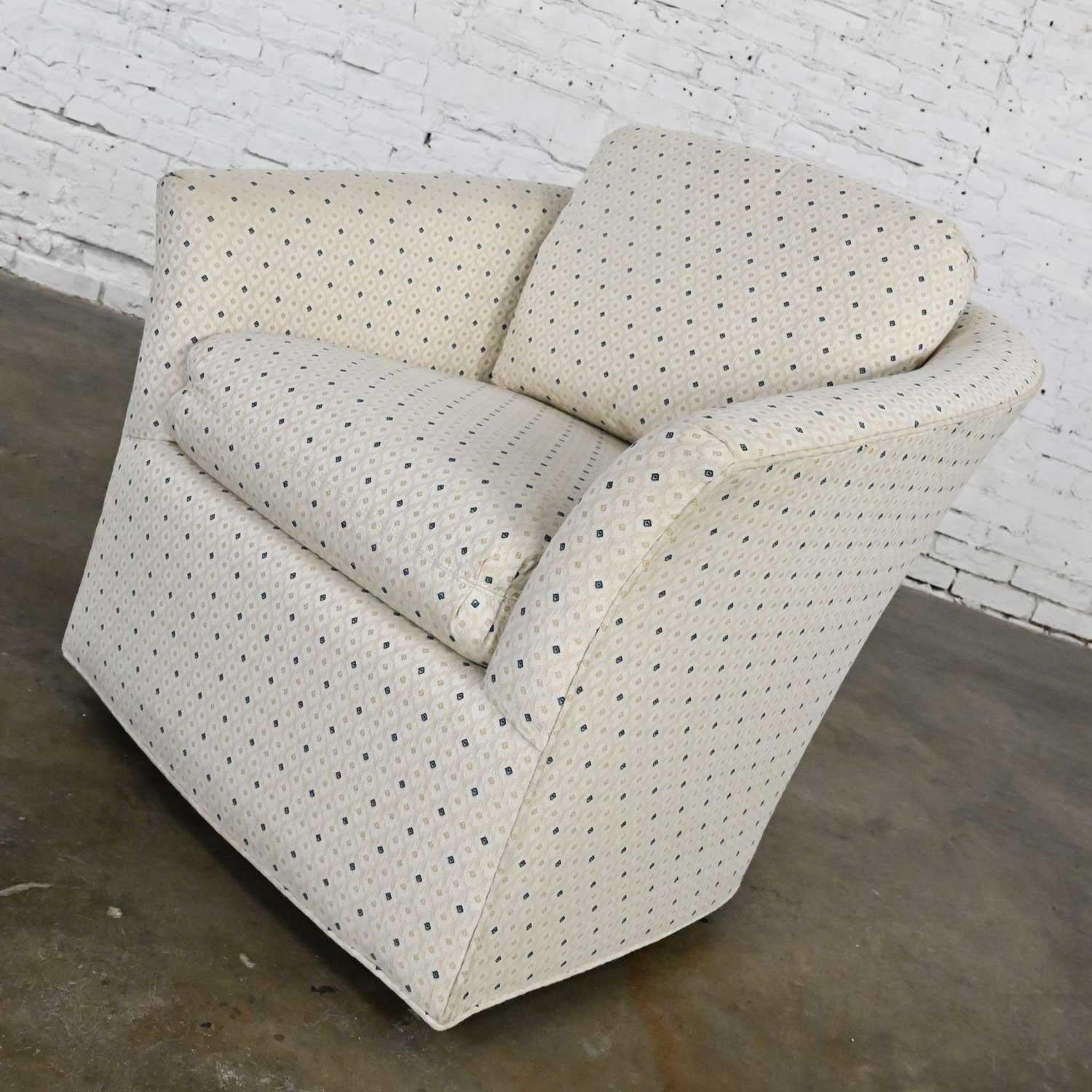 Lovely modern swivel barrel chair with off white & beige base & navy-blue diamond brocade fabric by Century Furniture. Beautiful condition, keeping in mind that this is vintage and not new so will have signs of use and wear. There are no outstanding