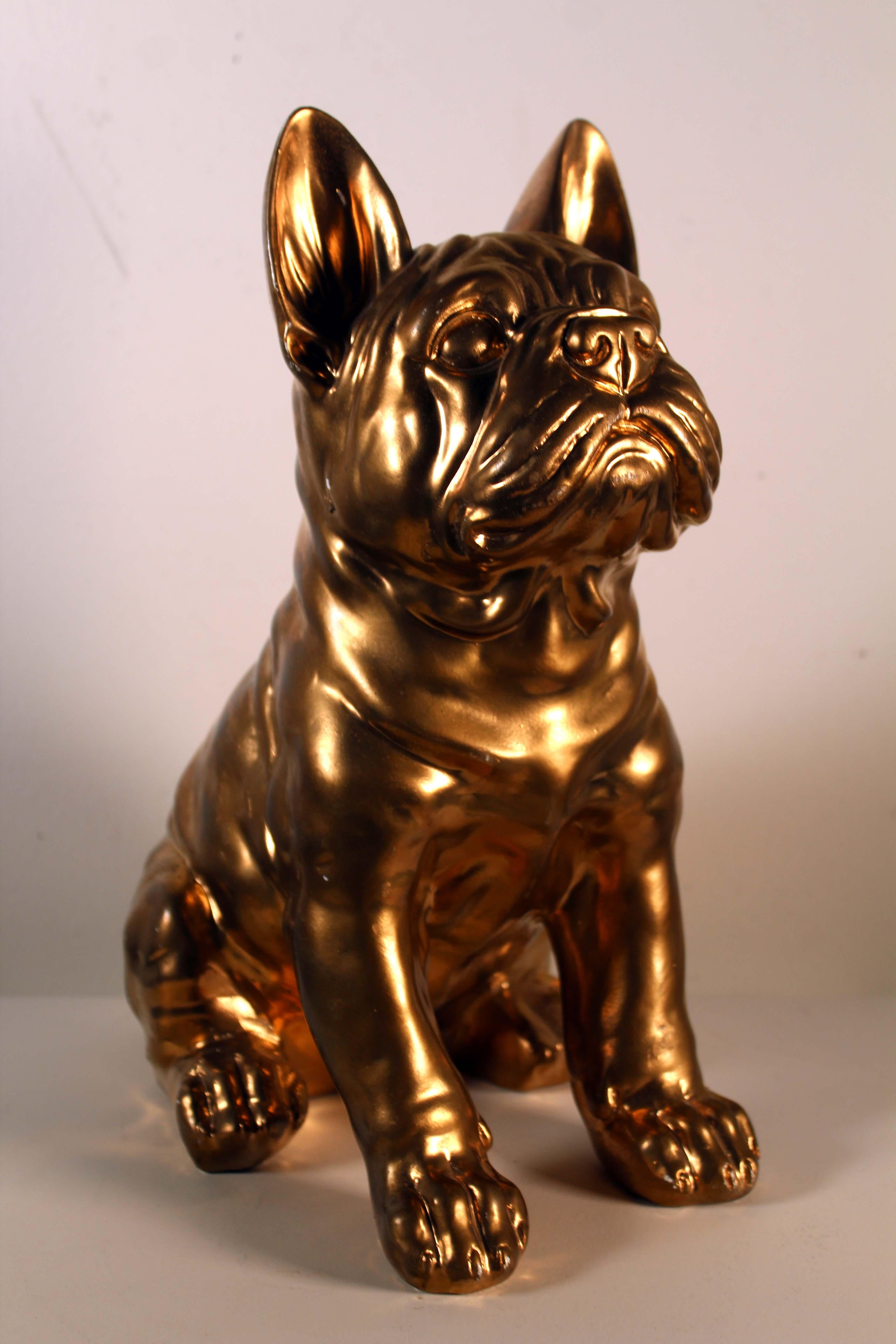 This 24k gold titled Frenchie sculpture with bone up for consideration. The gold creates the ultimate 