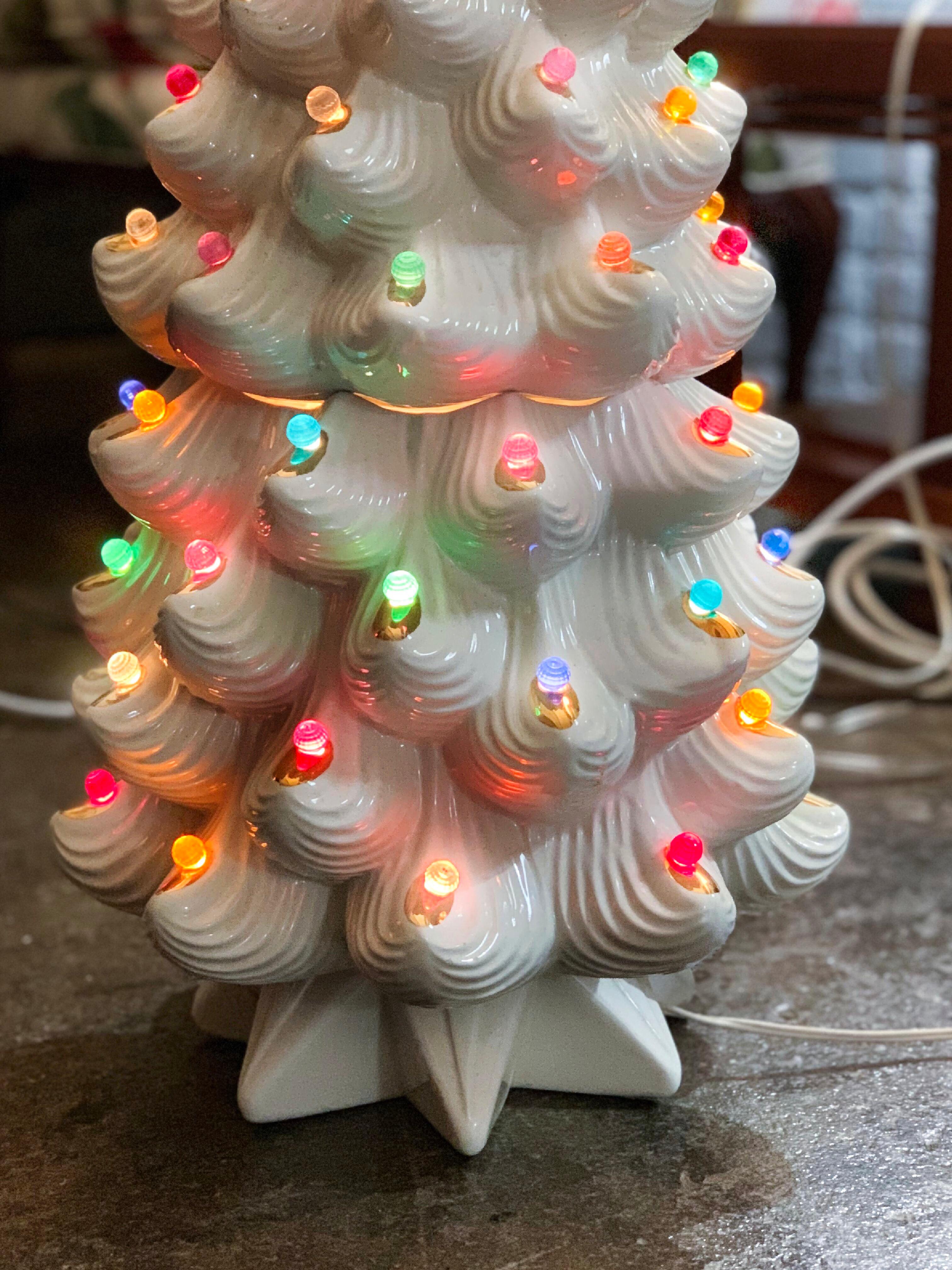 Monumental midcentury ceramic Christmas tree, Atlantic mold, white, gold tips, three-part assembly, height 33.5”, diameter at widest is about 14”.