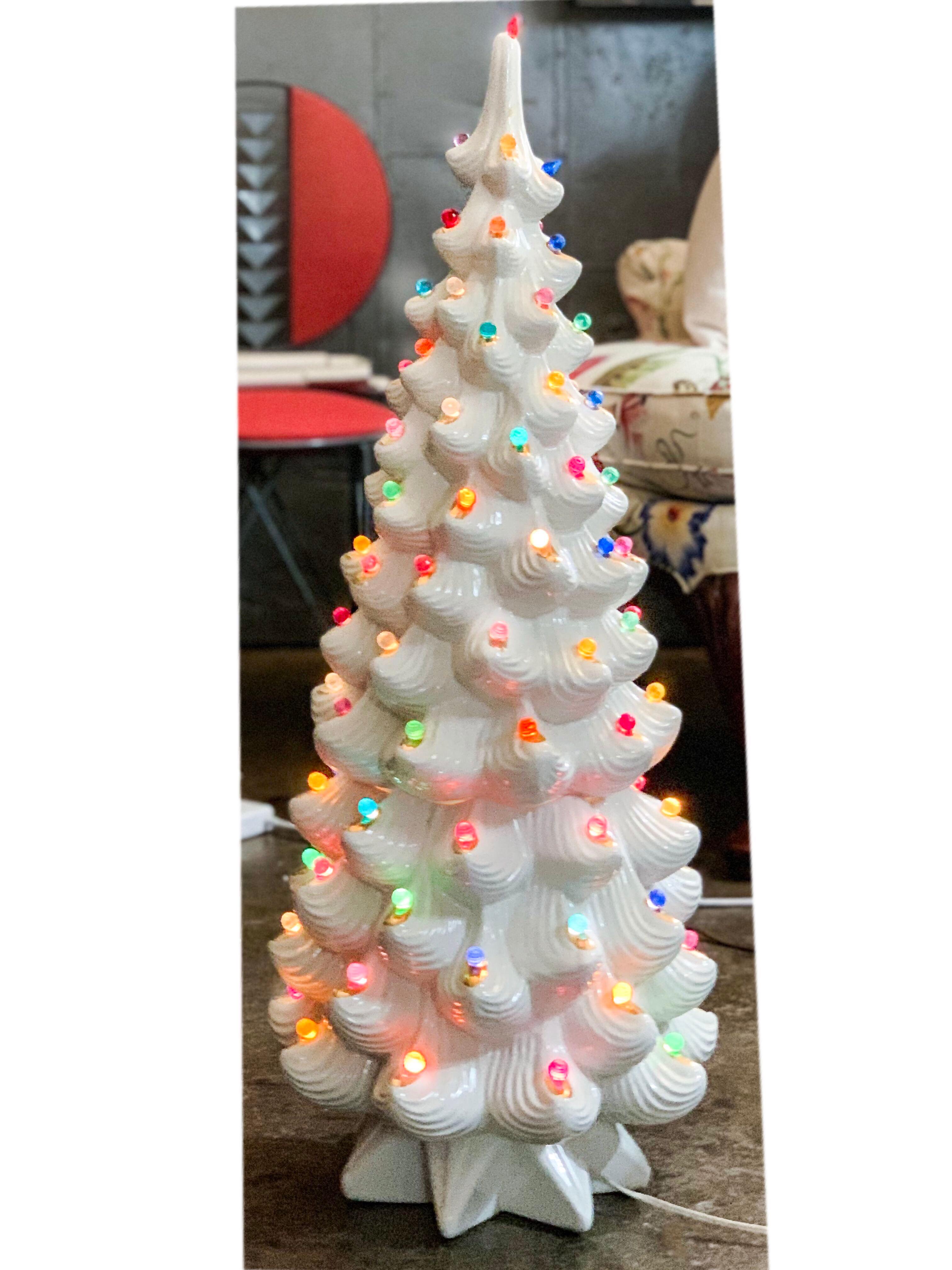 Monumental midcentury ceramic Christmas tree, Atlantic mold, white, gold tips, three-part assembly, height 33.5”, diameter at widest is about 14”.
