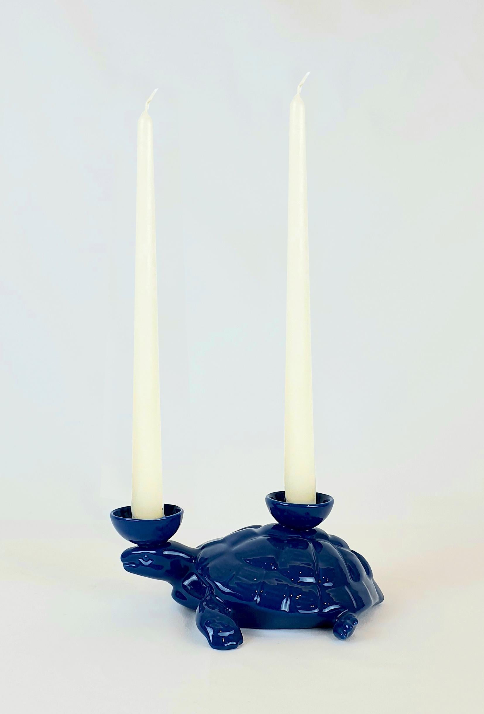 This turtle is part of an original collection of candle holder animals. The realization of the shape takes place through a mold with liquid clay; tiled and hand painted in a vast range of colours, from the most delicate pastels to the more saturated