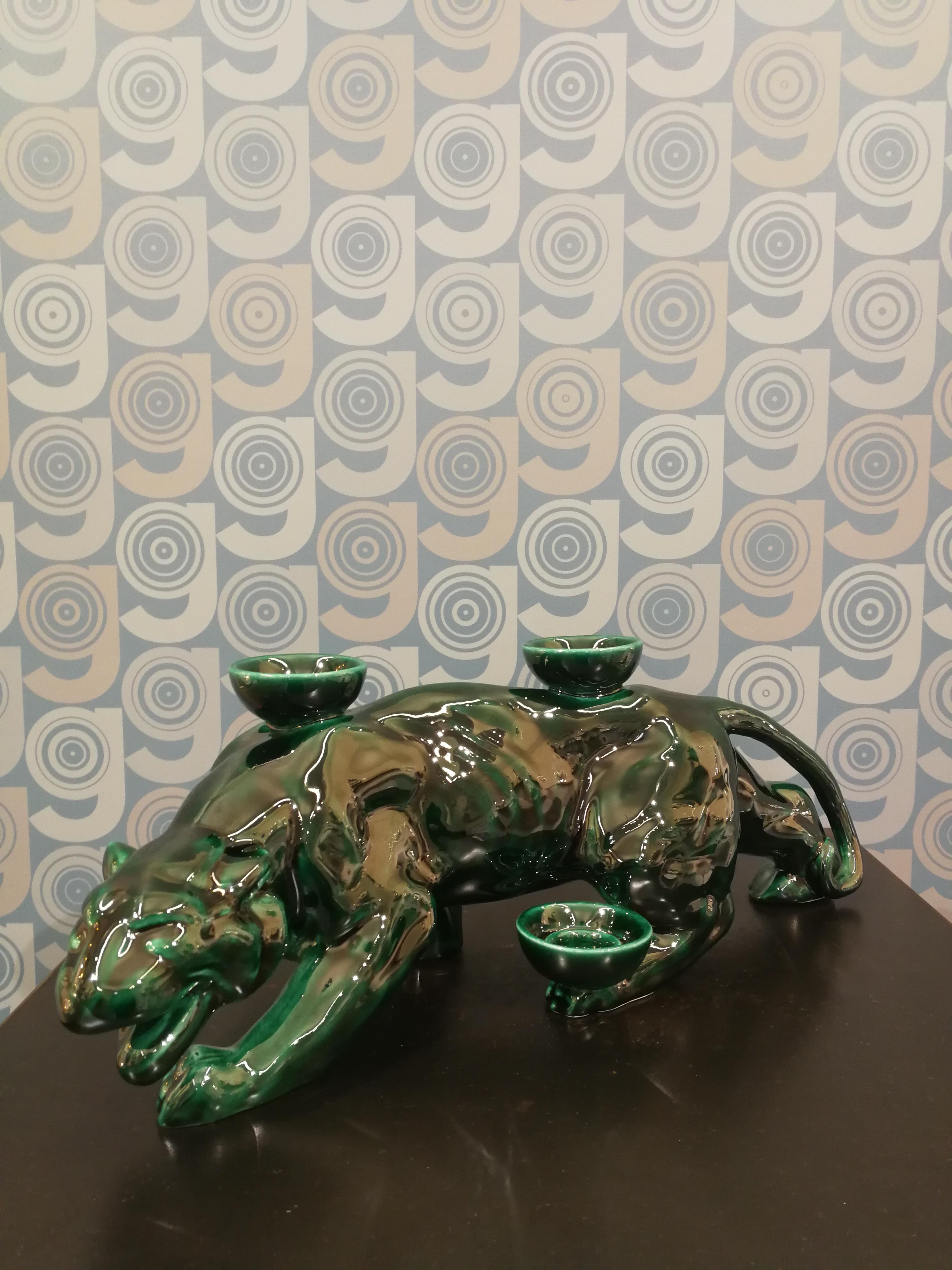This panther is part of an original collection of candle holder animals. The realization of the shape takes place through a mold with liquid clay; tiled and hand painted in a vast range of colours, from the most delicate pastels to the more