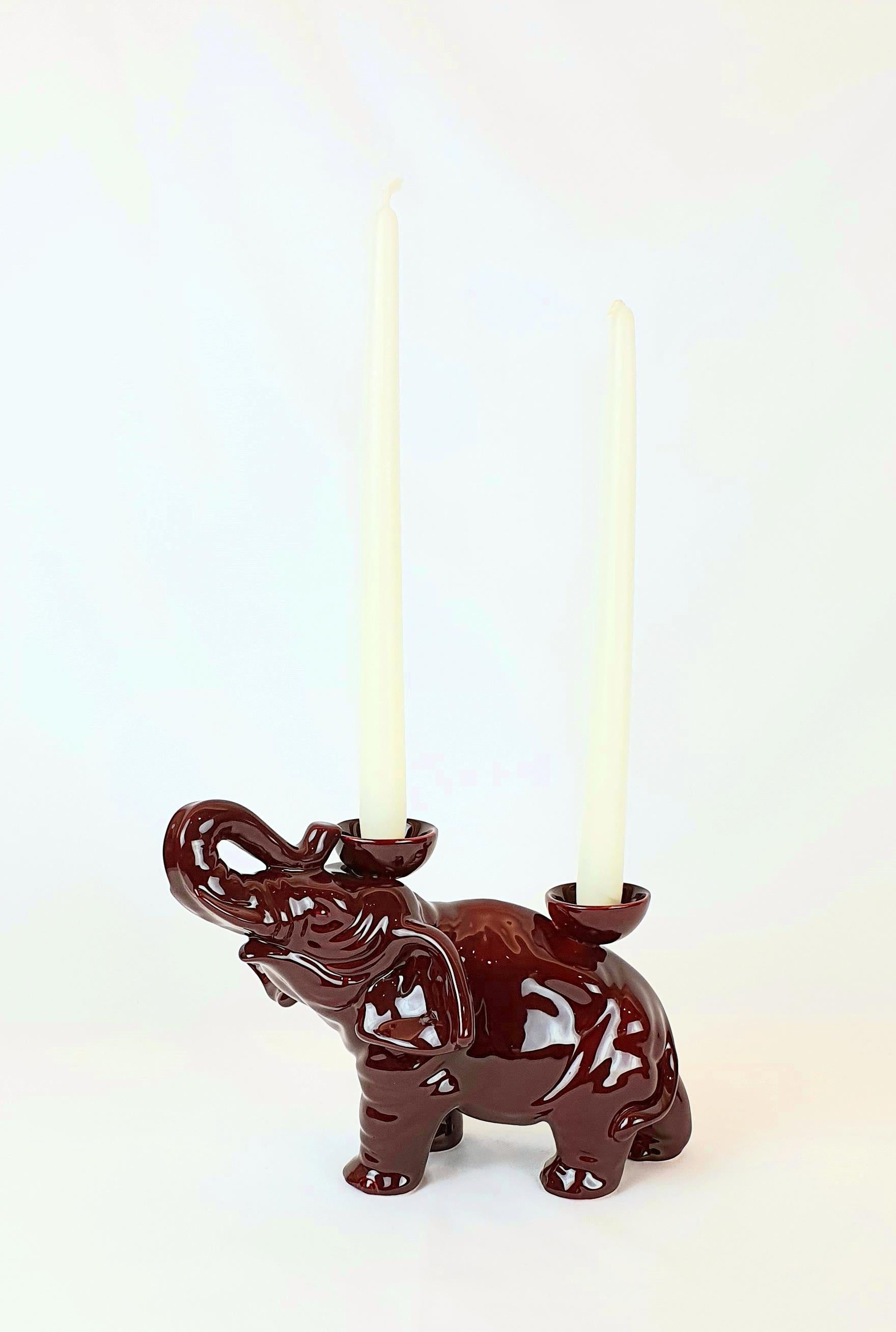 This elephant is part of an original collection of candle holder animals. The realization of the shape takes place through a mold with liquid clay; tiled and hand painted in a vast range of colours, from the most delicate pastels to the more