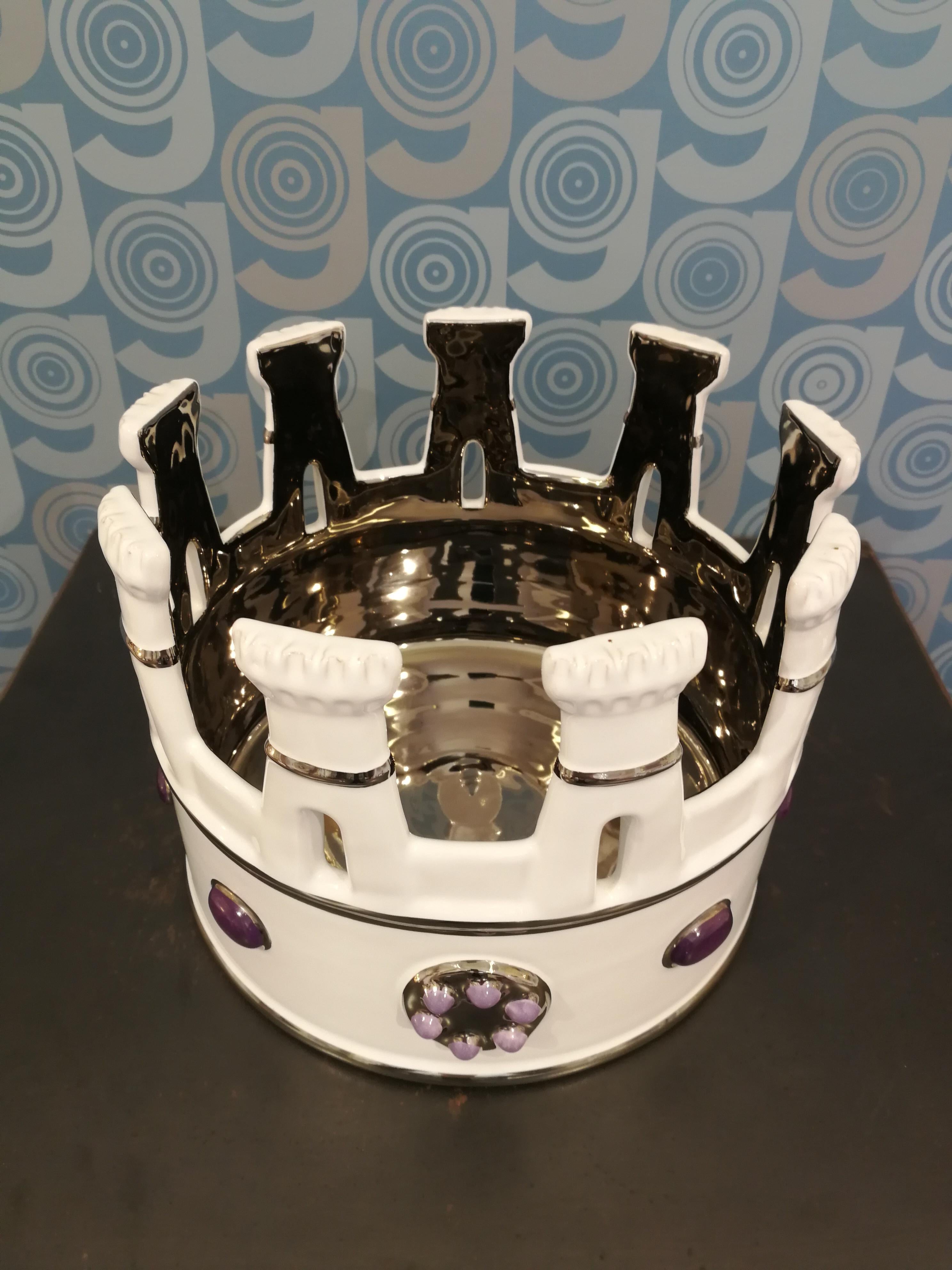 MARTA CROWN Centerpiece bowl in ceramic, made on the wheel and hand painted. The interior of the crown is entirely hand painted in platinum, while the exterior is in white majolica and features tower-shaped motifs, as well as being set with embossed