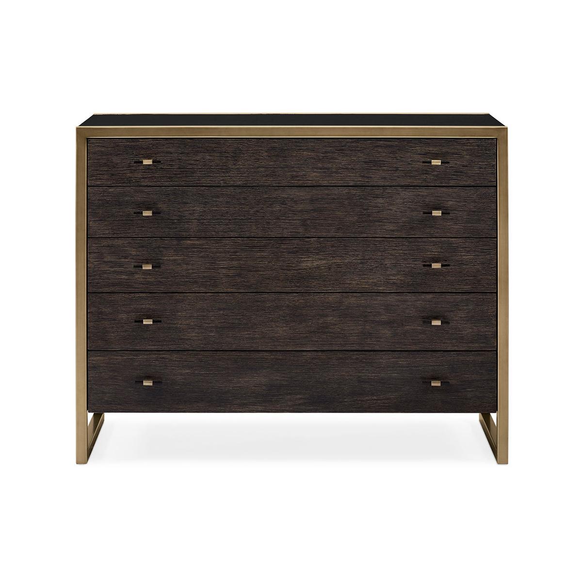 a restrained silhouette is brought to life with a modern layering of bold finishes and warm metallics. While this single chest offers several spacious drawers beautifully finished in Cerused Oak, the beauty of the piece is found in its geometric