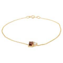 Modern Chain Bracelet in 14K Yellow Gold with Baguette Garnet & Pear-Cut Diamond