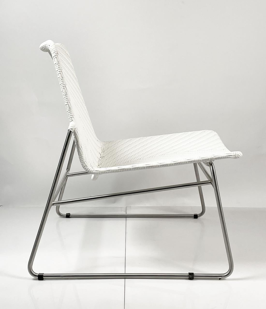 Contemporary Modern Chair with Chromed Frame and Faux Wicker Seat For Sale