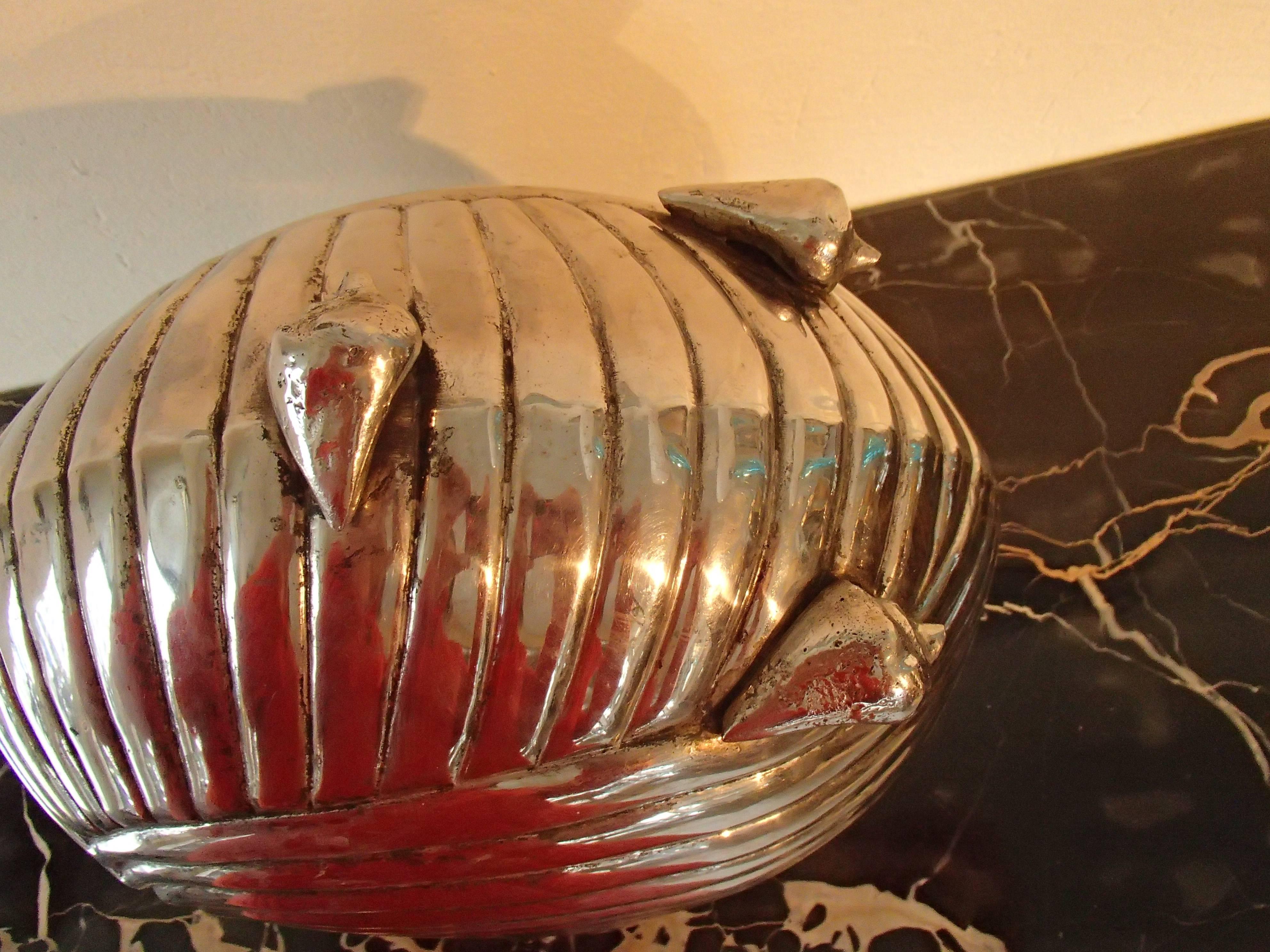 Modern champagne or vine cooler like a shell seen in 