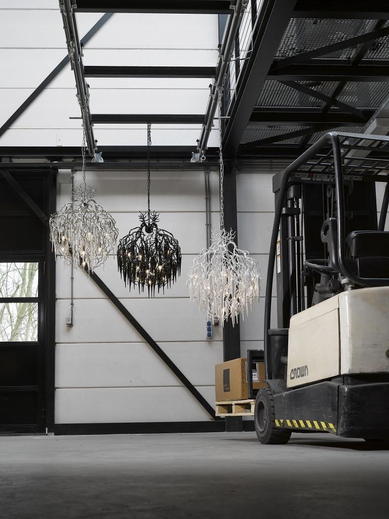 This modern chandelier in a nickel finish is dressed with mouthblown glass icicles, crafted in our own atelier. The Hollywood Icicles collection is designed by William Brand, founder of Brand van Egmond.

In the sheltered heart of a tree, when the