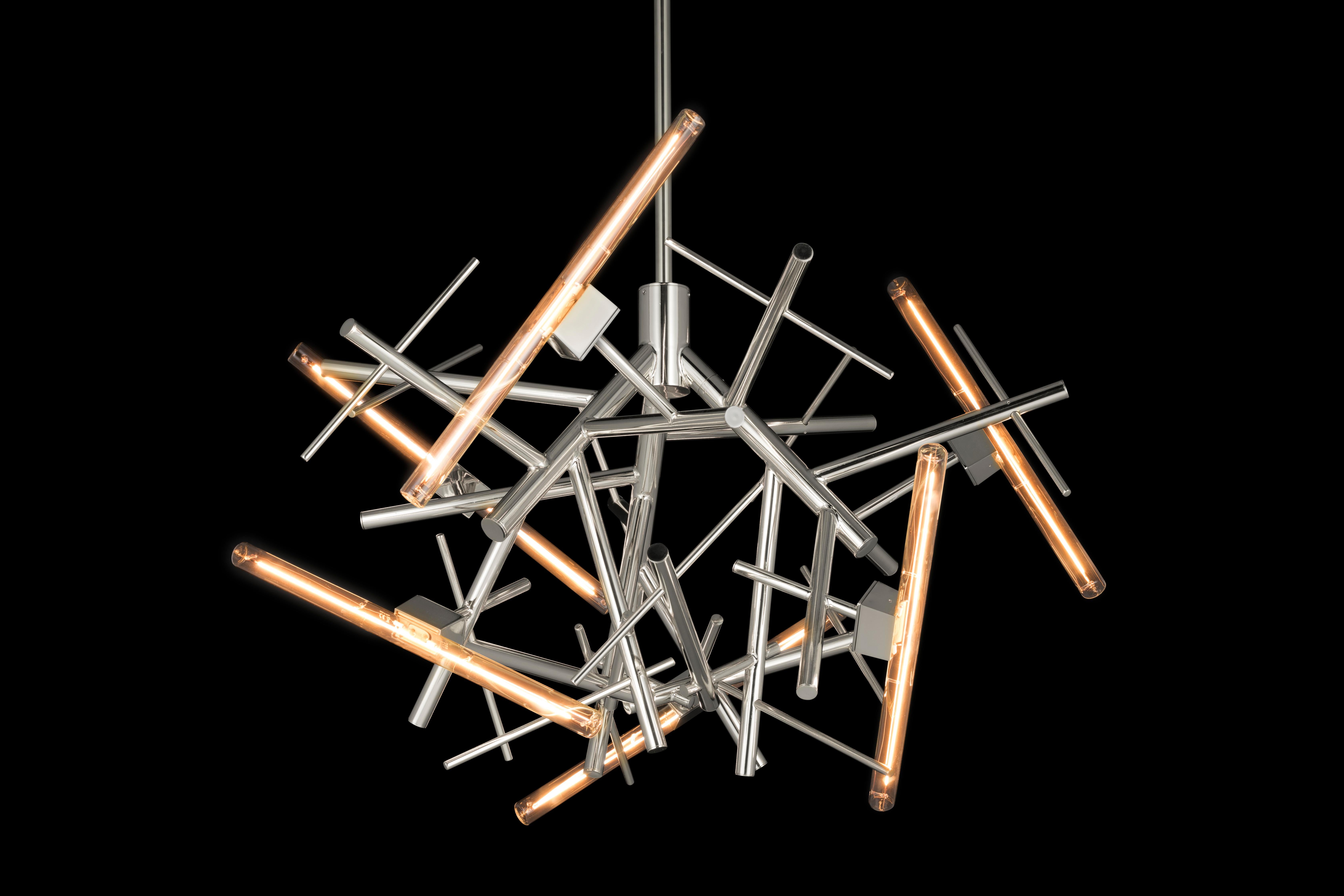The Linea, a modern chandelier in a nickel finish, is designed by William Brand, founder of Brand van Egmond. Evocative as surprising, the chandelier is available in four sizes in the finishes black matt, nickel, brass, brass burnished, and nickel