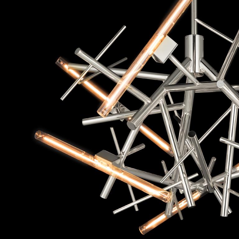 The Linea, a modern chandelier in a nickel finish, is designed by William Brand, founder of Brand van Egmond. Evocative as surprising, the chandelier is available in four sizes in the finishes black matt, nickel, brass, brass burnished, and nickel