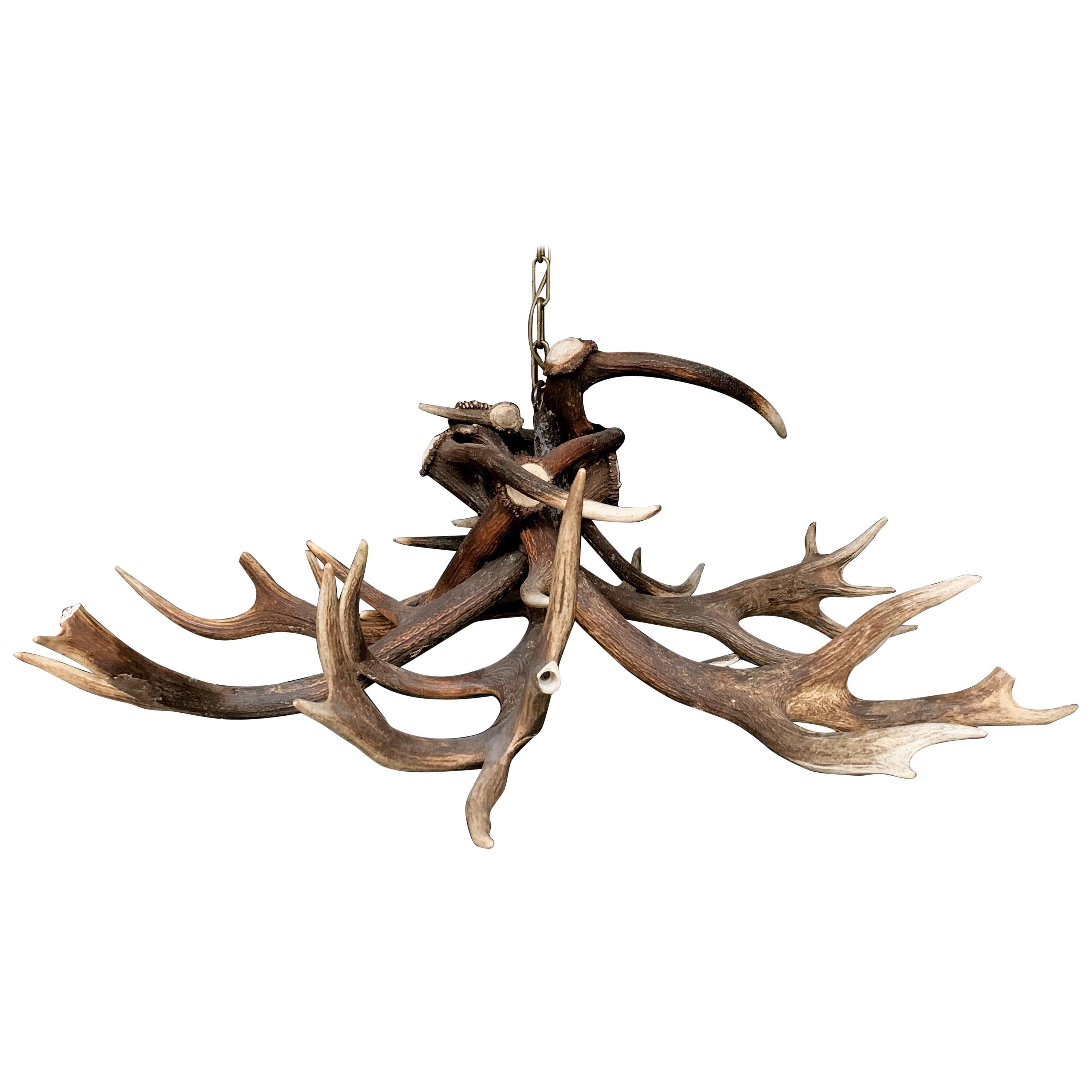 Modern Chandelier Made of Red Stag Antlers and LED Lights For Sale