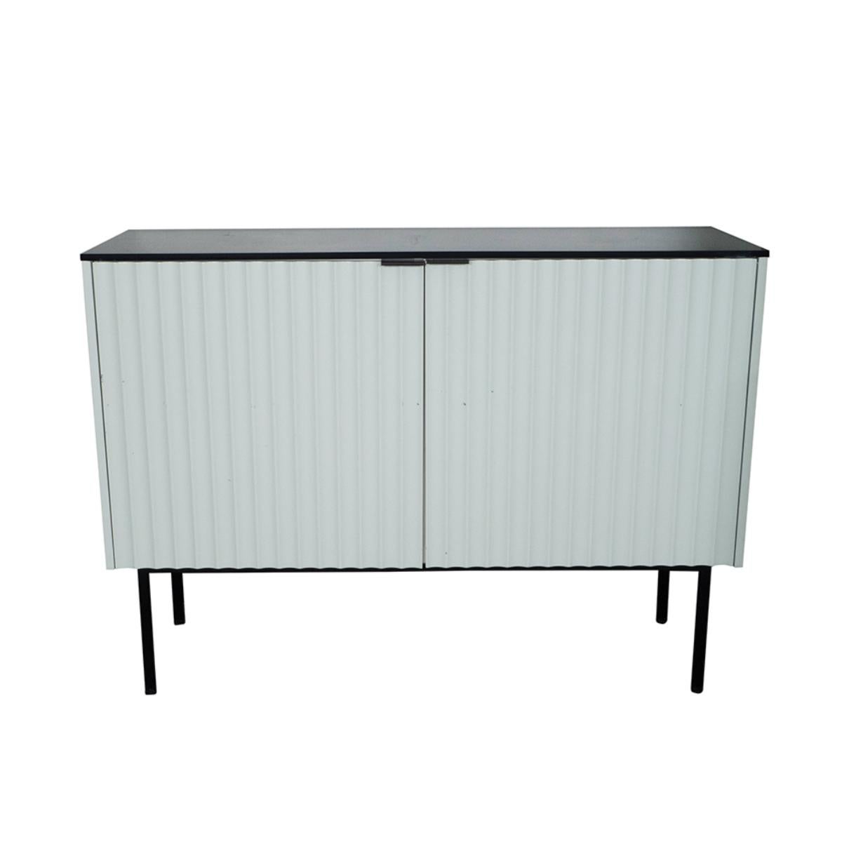 Modern painted, channeled front cabinet with interior shelves.