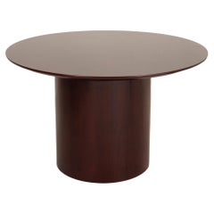 Mesa de comedor redonda moderna teñida de cerezo