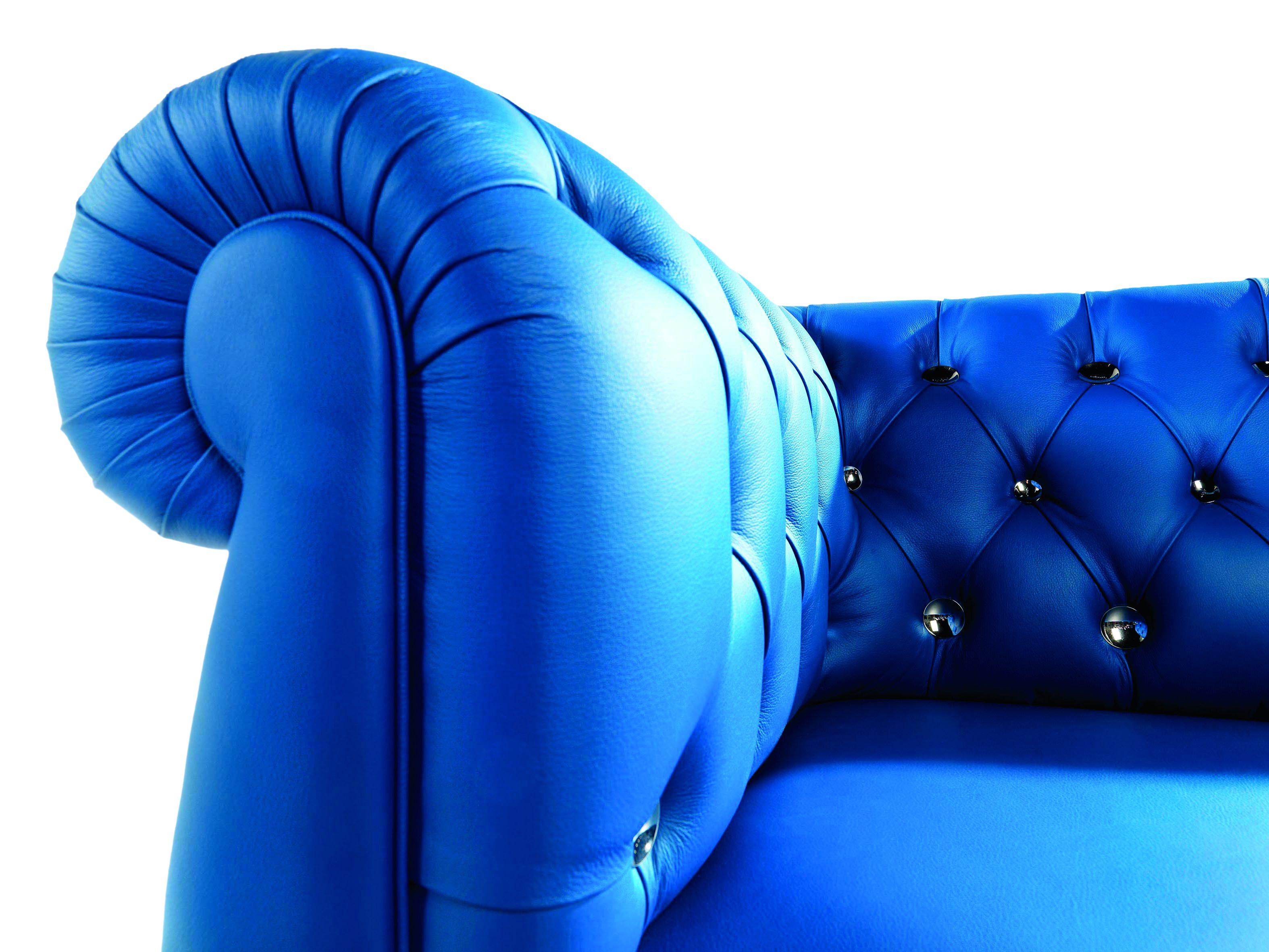 Anna Gili Luxury brand  blue Chesterfield. Contemporary classic chesterfield is a modern Chesterfield design by Anna Gili upholstered sofa in leather 2 seats with chromed buttons with legs in lacquered wood. Canova is a contemporary reinterpretation
