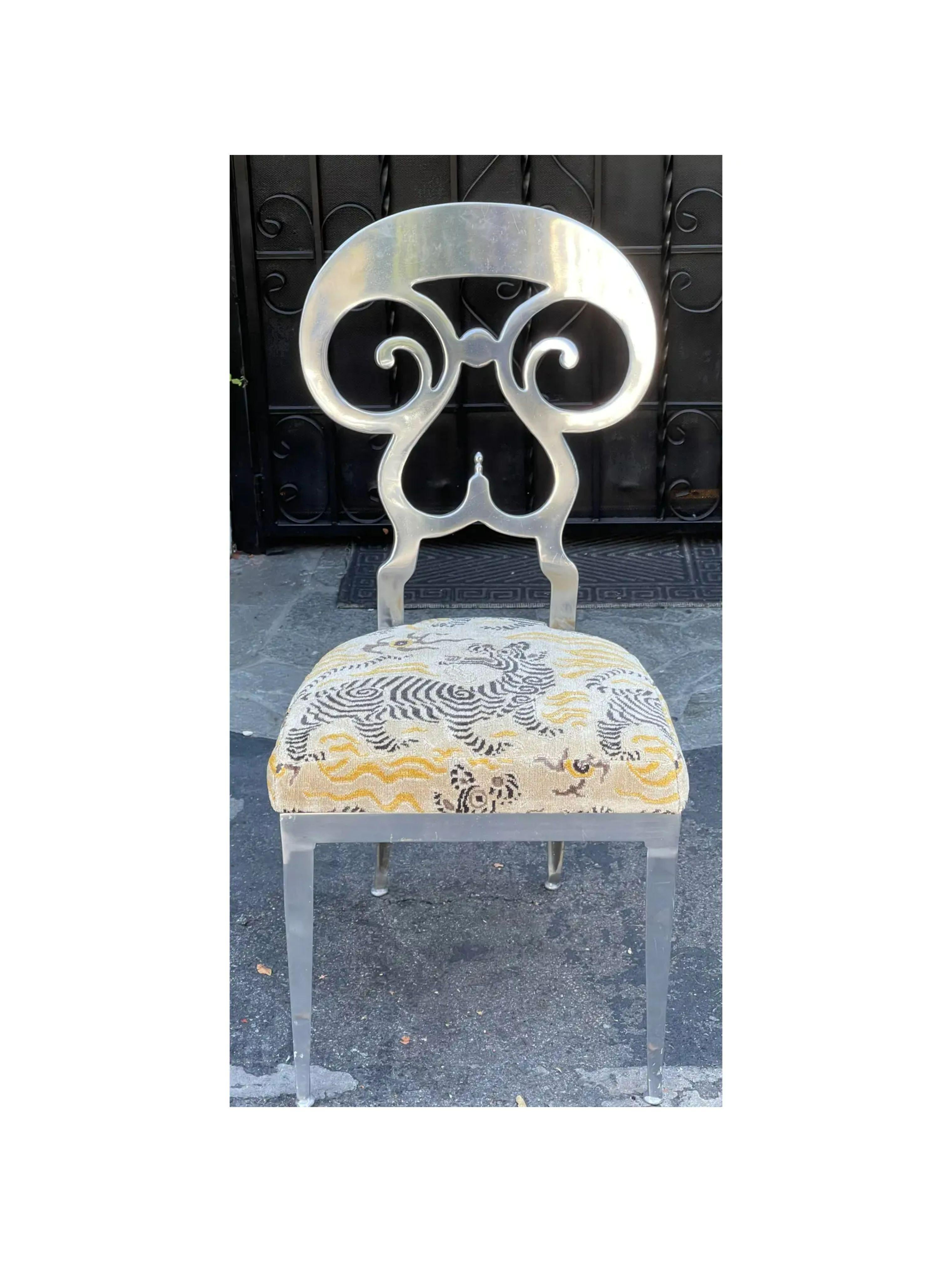 Modern Chiavari style polished aluminum chair w Clarence House Tibetan velvet seat. It features a polished steel finish and has been freshly upholstered in Clarence House Tibetan velvet.

Additional information: 
Materials: Aluminum,