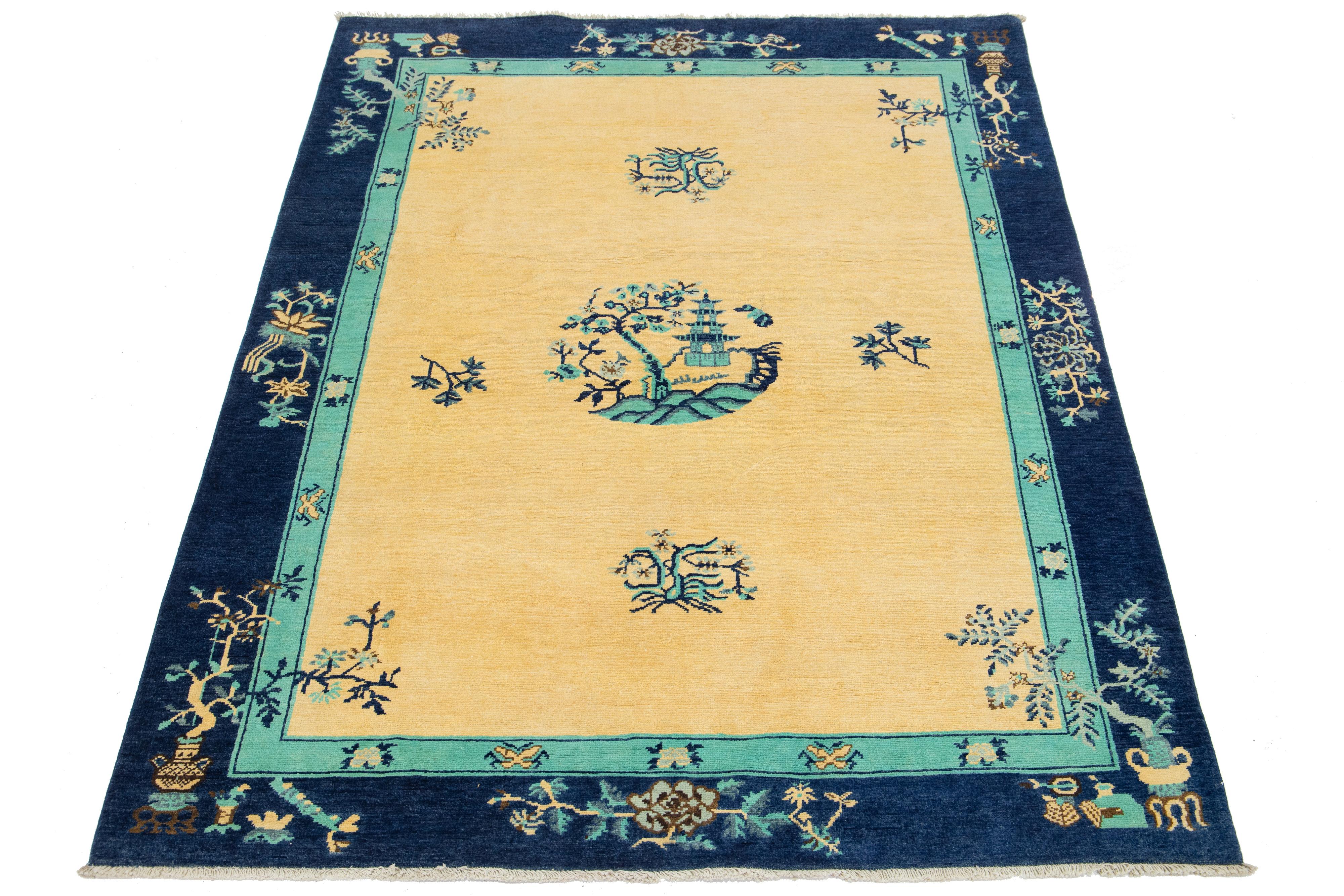A beautiful modern Chinese-style hand-knotted wool rug with a Chalky color field and navy blue and green accents throughout the traditional Chinese Peking design. 

This rug measures 5'8