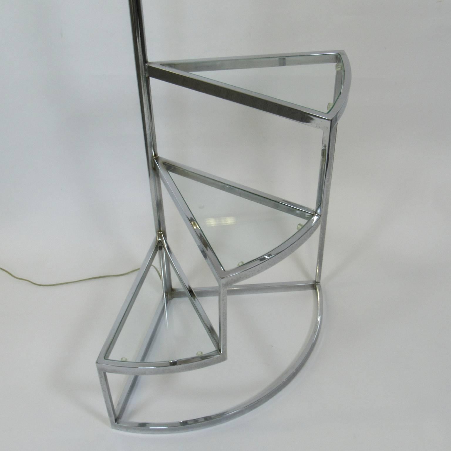 Modernist chrome and glass three-tiered table lamp. Measures: Overall height: 59 inches, étagère: 26 x 16 inches.