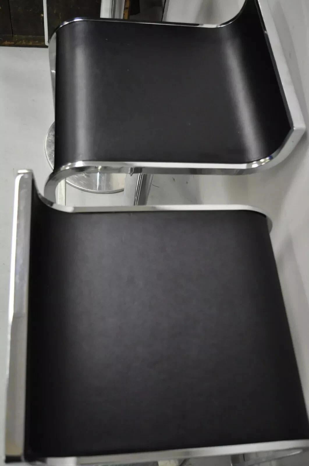 Cuir The Moderns Chrome and Steel Black Leather Adjustable Swivel Bar Stools - Set of 4 en vente