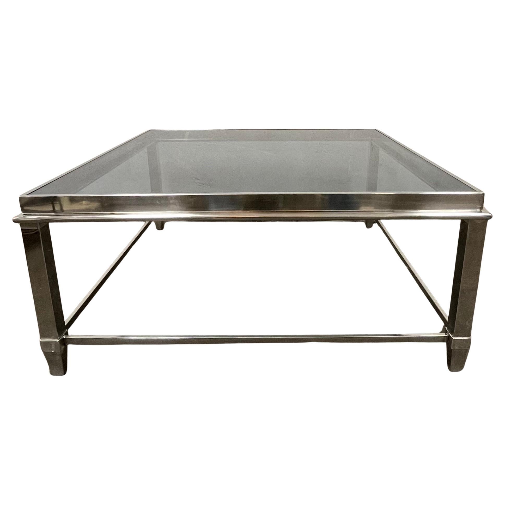 Mesa de centro moderna cromada con tapa de cristal negro
