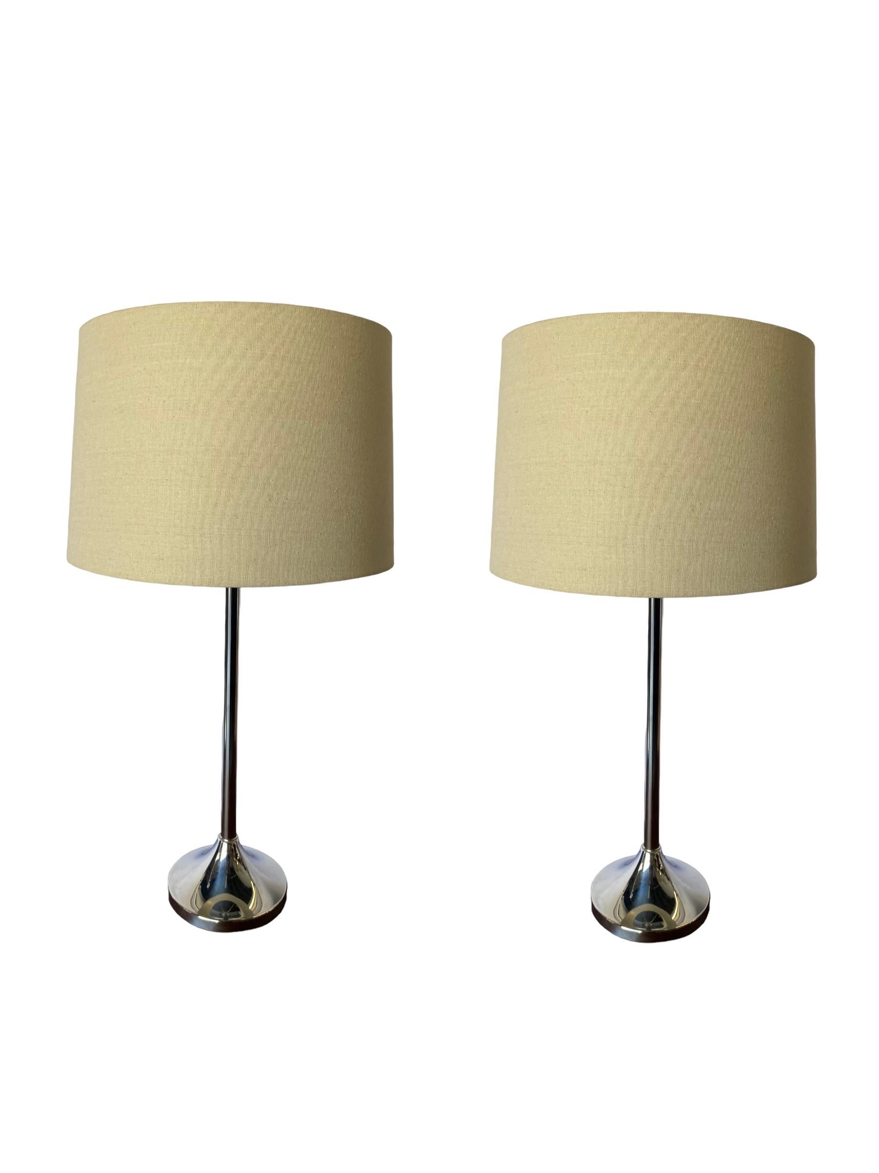 Pair of modern chrome table lamps with tulip style pedestal base. Elegant minimal modern design. Chrome is in good condition with no rust or pitting. Lampshades sold separately. 