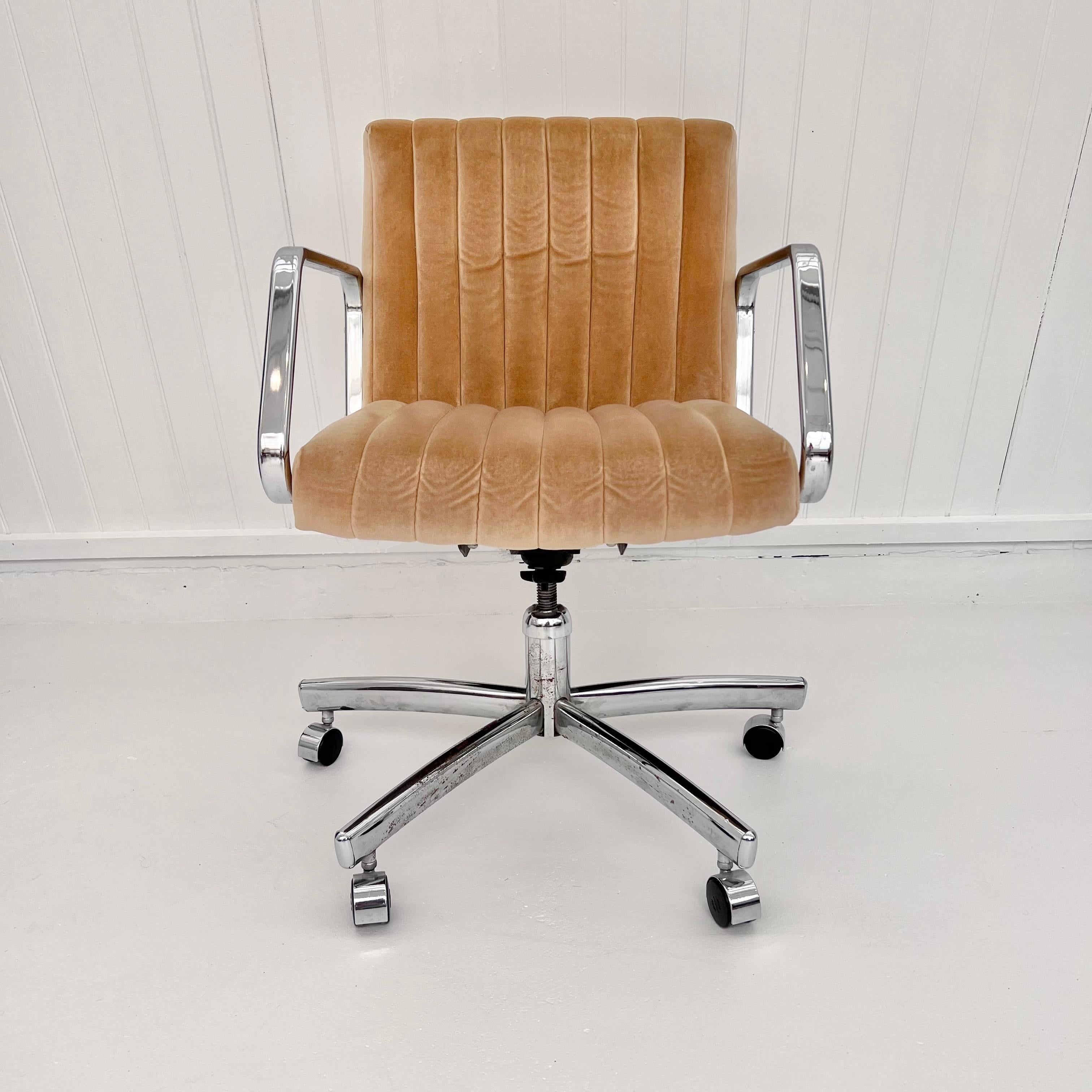 Extremely comfortable and chic modern chrome and tufted velvet office chair from the 1980's. 100% Polyurethane foam cushion and back. Chrome armrests, base and casters. Original 'Daubman's Quality Office Furniture, Poughkeepsie, New York' sticker