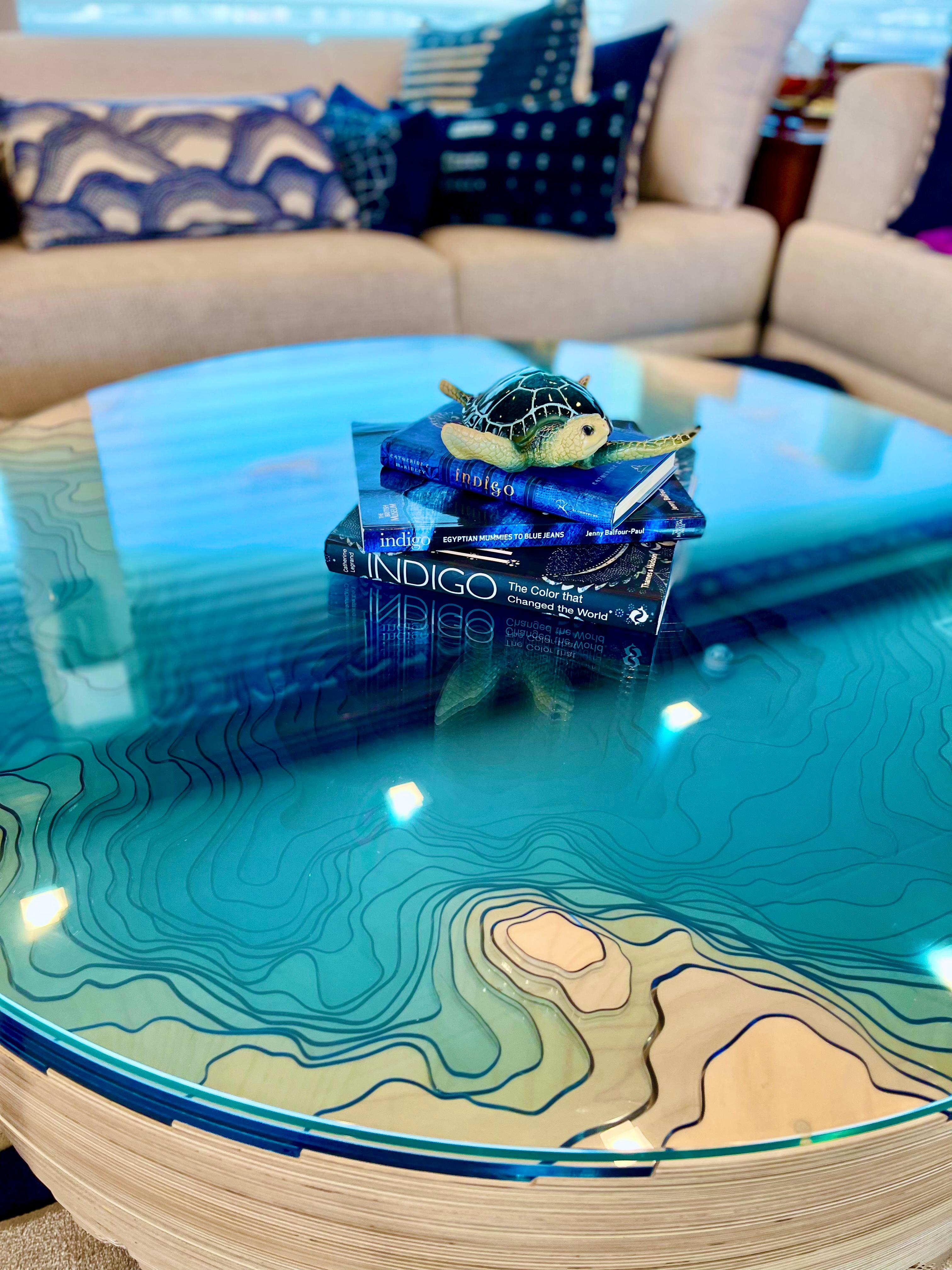 The Abyss Horizon is a unique, modern coffee table design from Duffy London. This listing is for a Yacht edition piece, especially designed to be more light-weight and comes with internal bolt holes for fixing to the ground.

A dramatic, circular