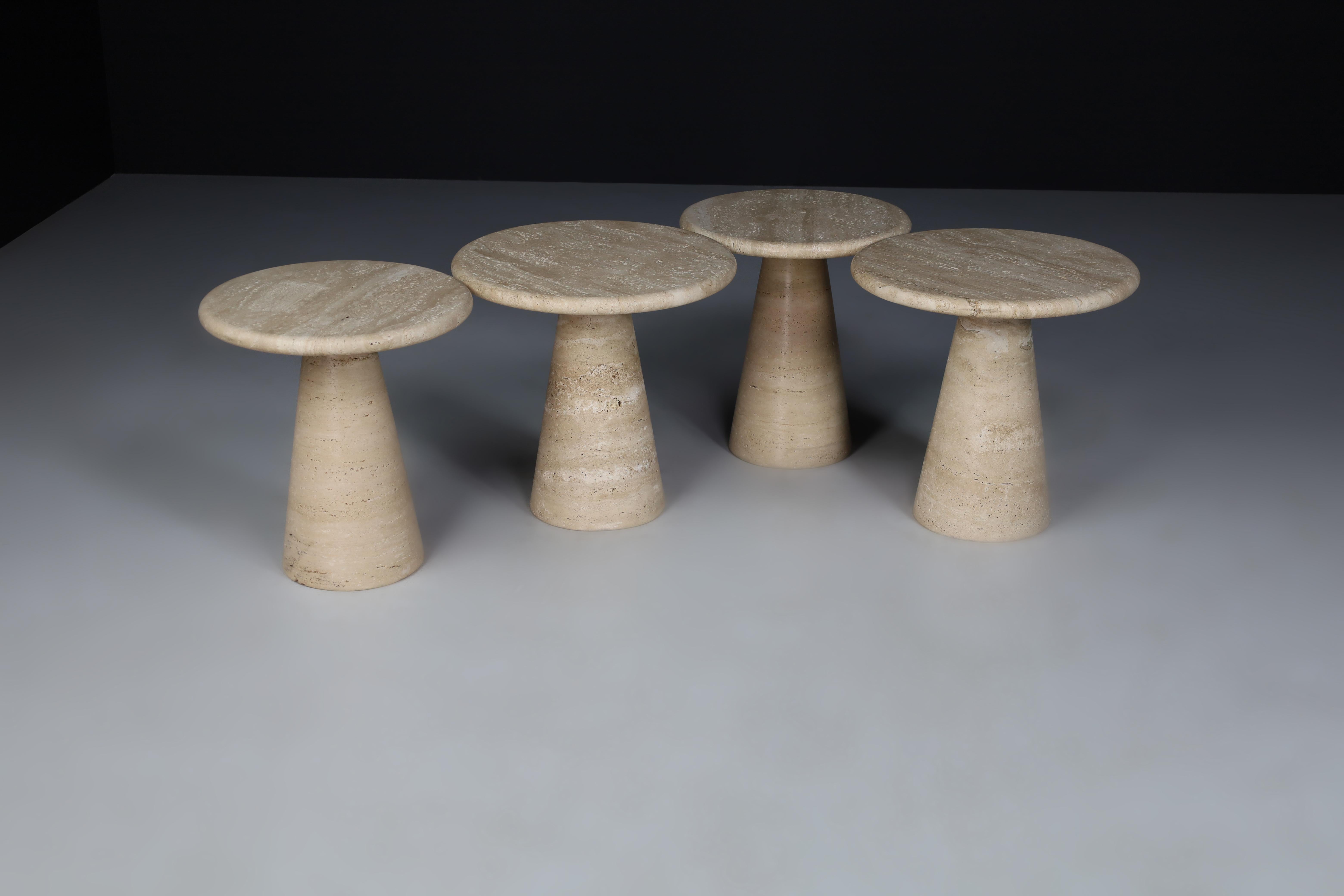 Set of four modern circular travertine side tables or coffee tables , Italy 1980s.

A set of four of circular side tables style of Angelo Mangiarotti in travertine with a conical shaped base. The form is extremely simple allowing the beauty and
