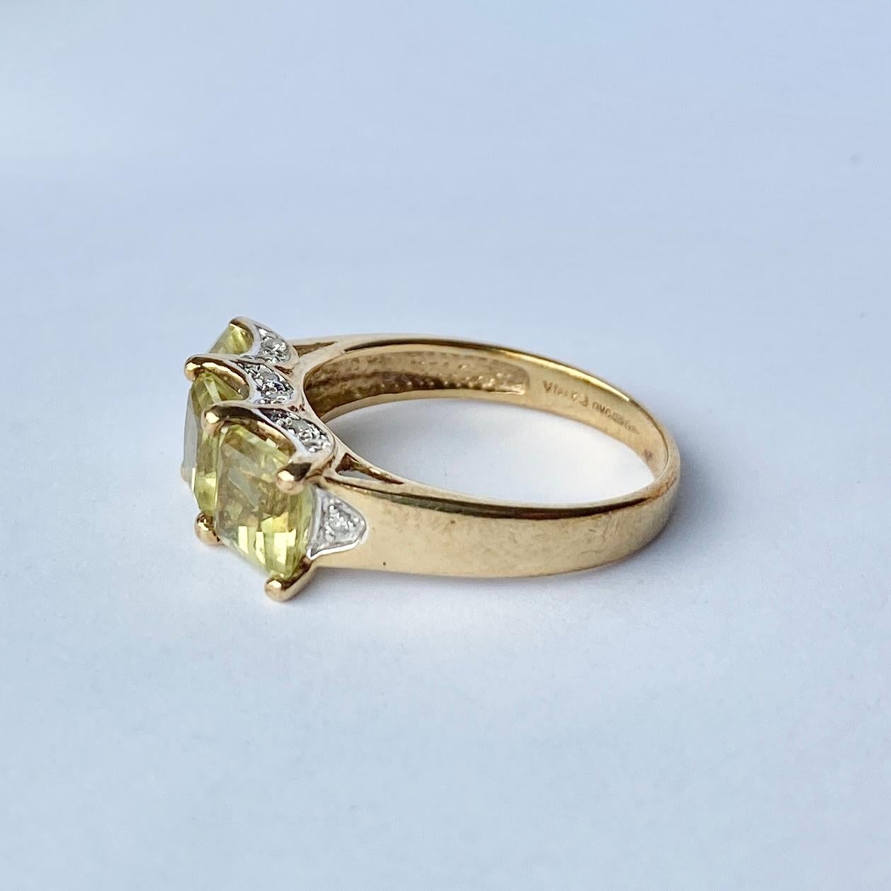 This gorgeous ring has three pale yellow citrine stones each measuring 1ct with a diamond set gallery. The ring is modelled in 9carat gold. Diamond total 30pts.

Ring Size: Q or 8

Weight: 3.6g