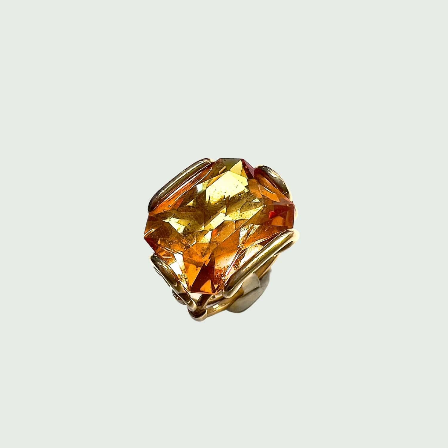 Introducing a captivating piece of modern jewelry: the 21st Century Citrine Spinel Ring crafted from 18-karat yellow gold. This exquisite ring features a vibrant citrine spinel gemstone, adding a pop of color and sophistication to any ensemble.
What