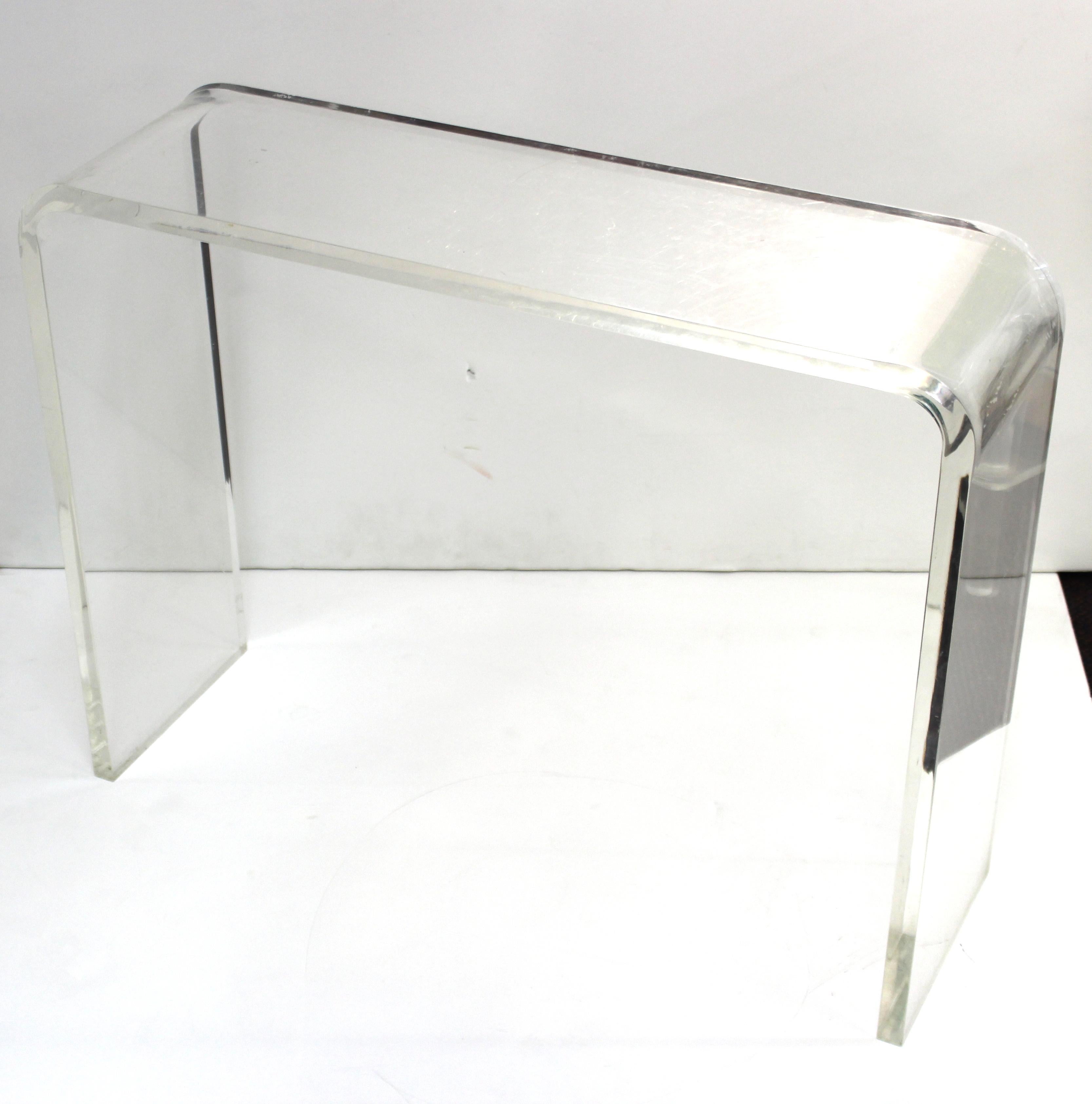 clear waterfall console table