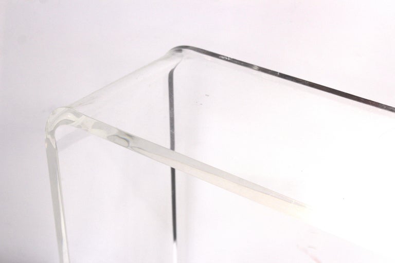 Modern Clear Lucite Waterfall Console Table at 1stDibs | acrylic waterfall  console table, clear waterfall console table, lucite waterfall table