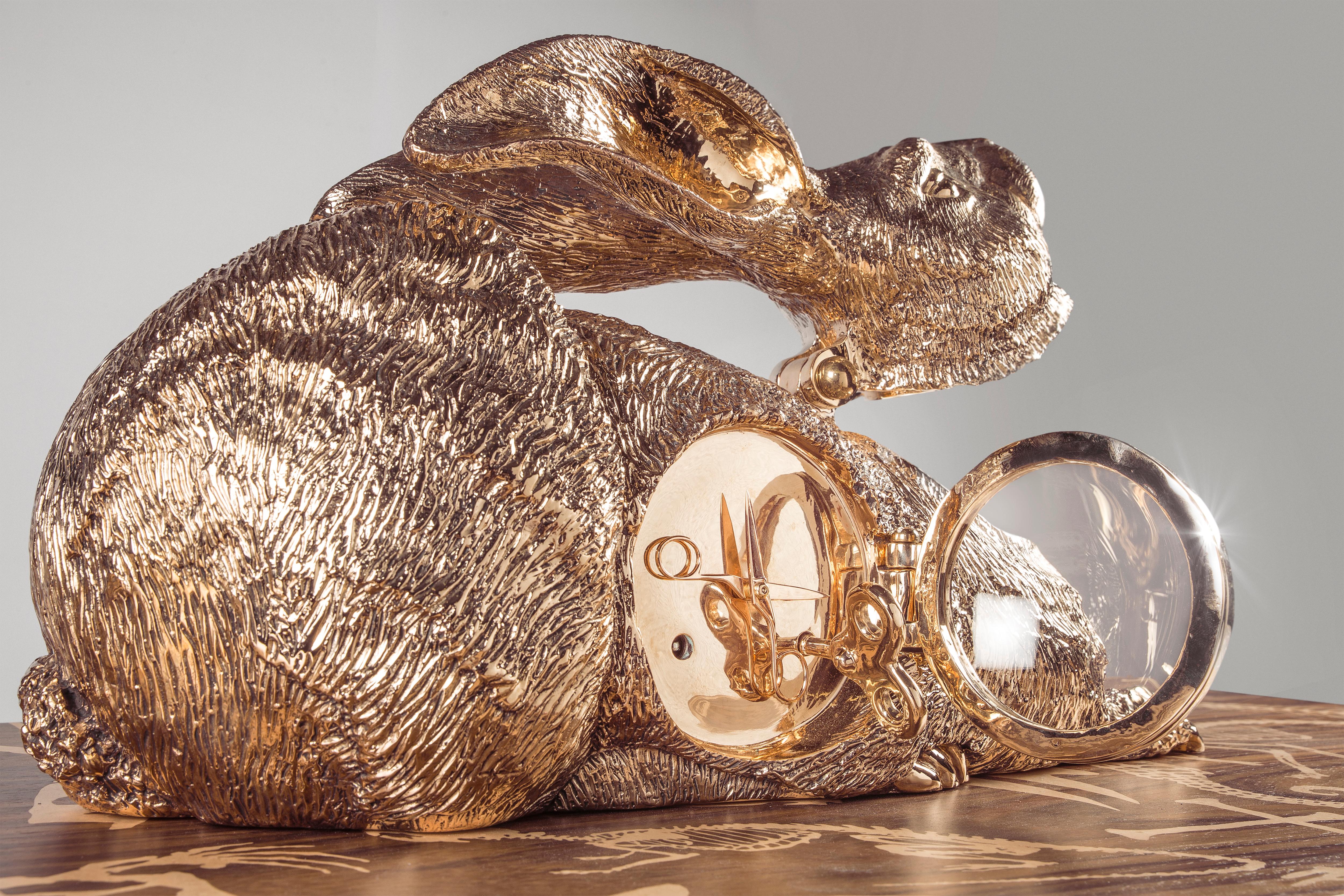 Mechanical clock made of bronze fusion. The hare seems calm in its rest or frozen in sense of danger, the mechanical clockwork within its side has scissors that 'snip' away the time hour-by-hour.

This piece was presented for the first time on the