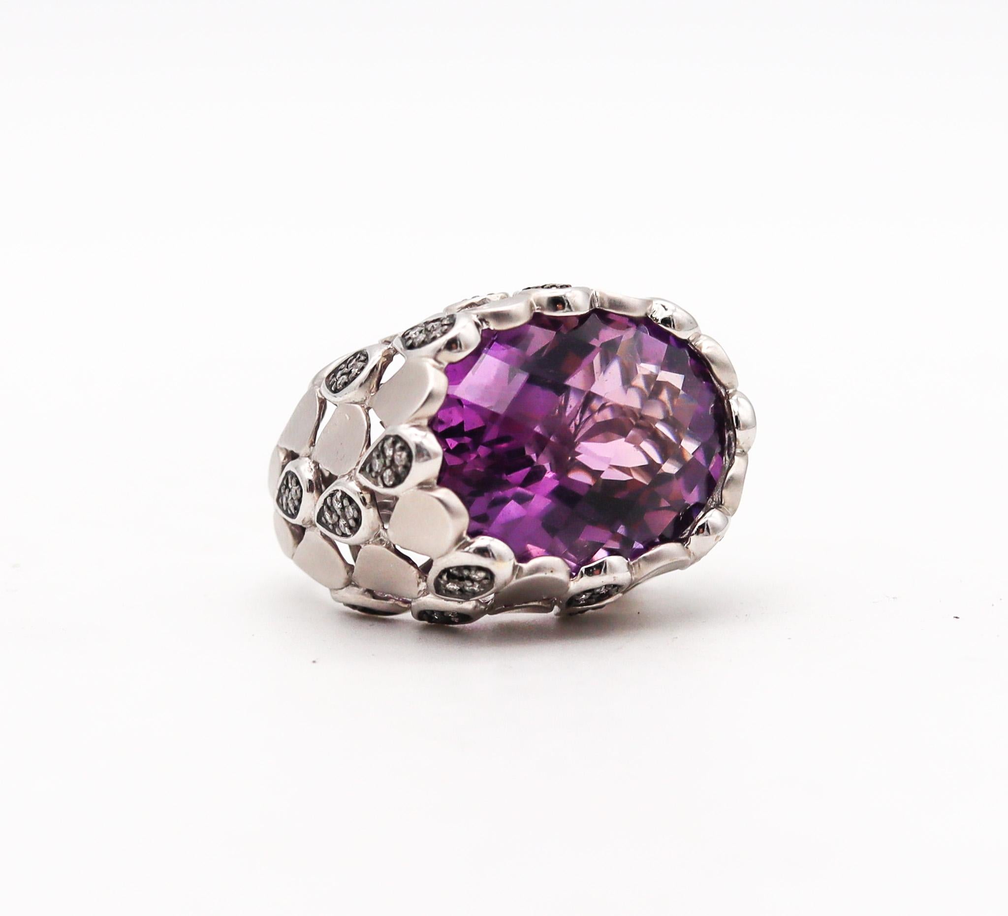 Modern cocktail ring with gemstones.

Very elegant every day cocktail ring, crafted in Italy in solid white gold of 14 karats. The scalloped surfaces are treated with brushed and high polished finishes and is embellished with natural earth mined