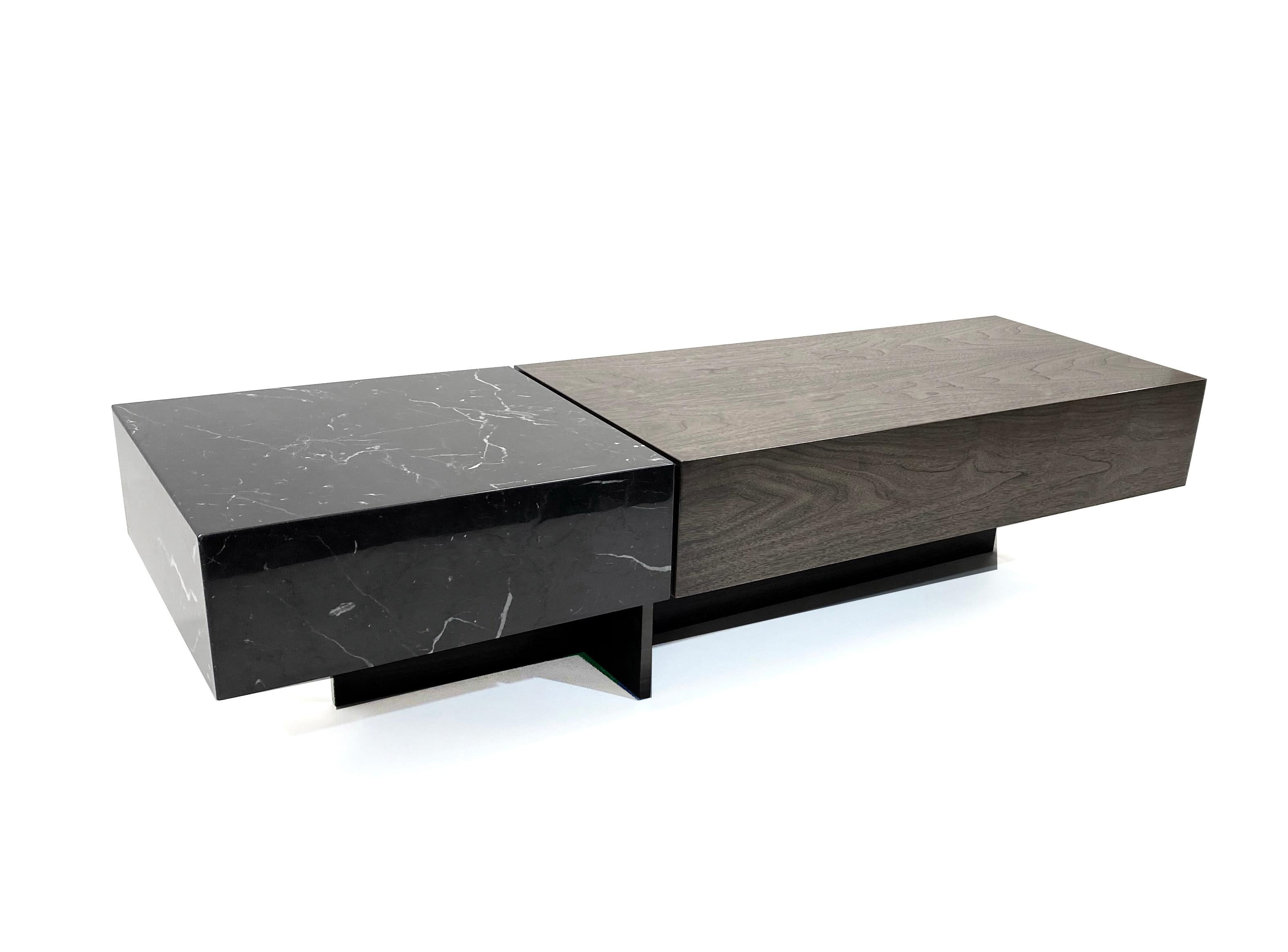 The Charlie Cocktail Table.

Pictured in Ebonized Walnut and with Vanilla Noir Ceaserstone 

To inquire about custom sizes, and additional wood / stone configurations please contact the manufacturer.
