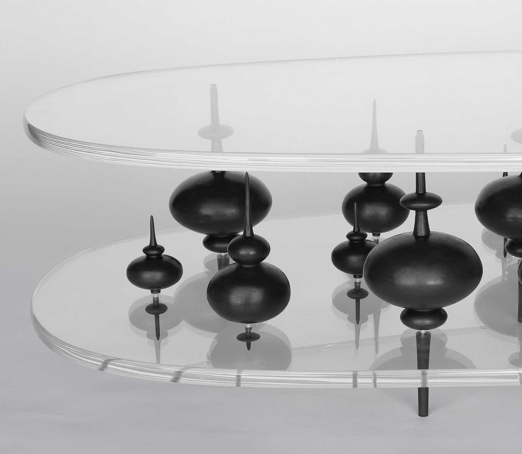 American Modern Cocktail Table with French Black Bronze Minarets Between Lucite For Sale