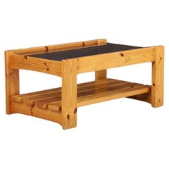 Modern coffee table in pine and smoked glass by Maison Regain, France 1970s.