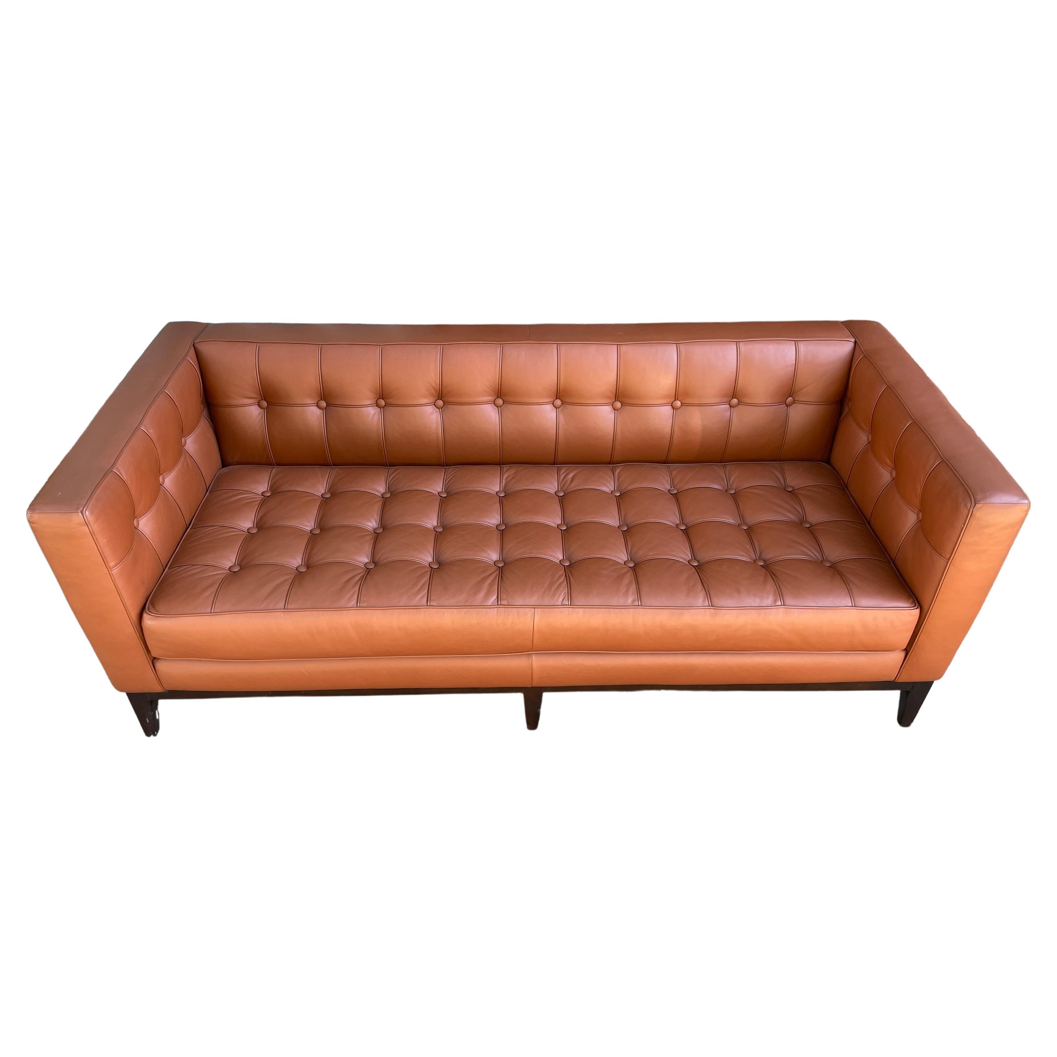 Beautiful Mid-Century Modern style luxe Cognac Brown tufted sofa by American Leather company for Jensen Lewis NYC. Very High Quality Leather soft and comfortable Great Modern Design. Available In Brooklyn NYC.

Measures: 74” L x 33” D x 27” H - SH