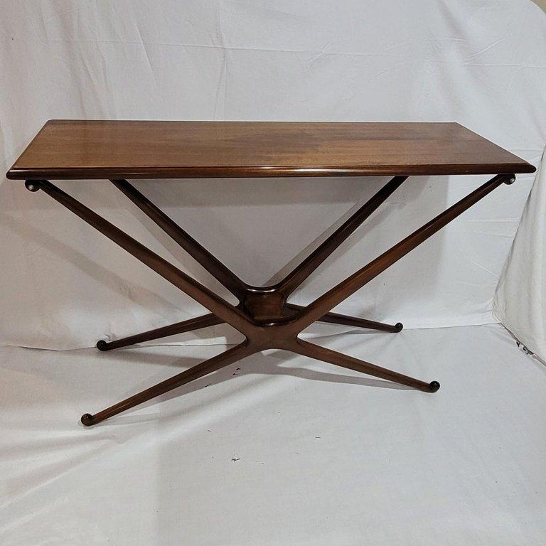 Luxury Hand-Carved Console Table in Solid Walnut
Elevate your space with this exceptional hand-crafted console table, crafted from a single solid block of premium walnut. Designed for the discerning collector, this original creation is the result of