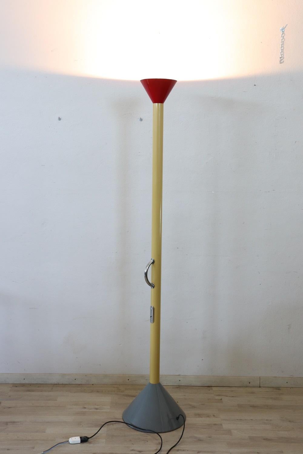 Created in the early 1980s by the great designer Ettore Sottsass, Callimaco is an object with an ambiguous and ironic design, a luminous sculpture inspired by the famous Greek artist Callimaco of Athens from the 5th century. The Callimaco floor lamp