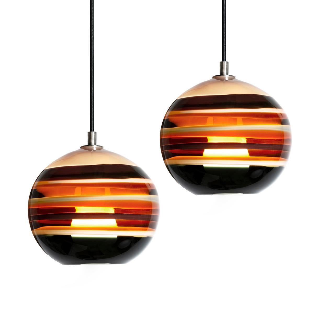 Pair of Amber Banded Orbs with Black cloth cord and satin nickel finish - In stock - Available Now
Measures: 9