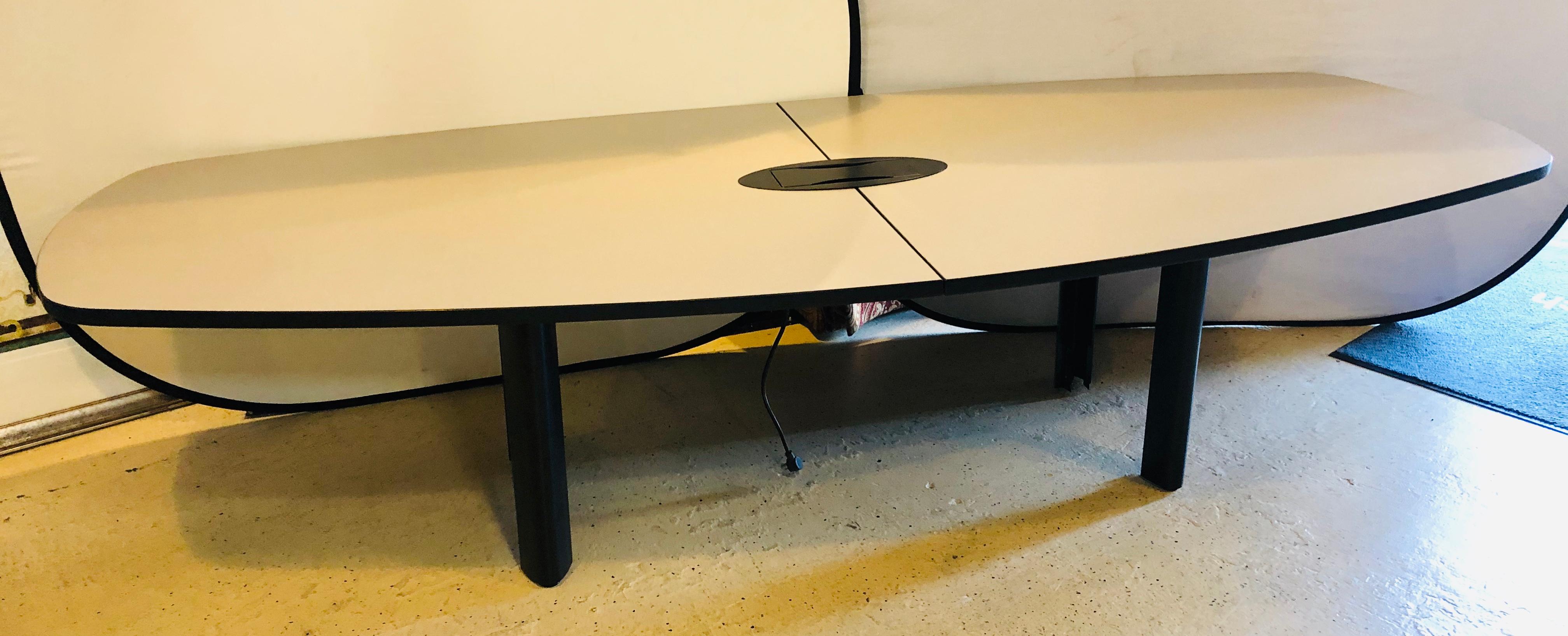 Modern conference table with electric priced for immediate sale.