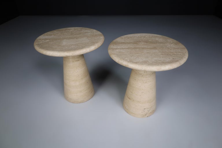 Modern circular travertine side tables or coffee tables, Italy 1980s.

Mid-Century Modern circular side tables style of Angelo Mangiarotti in travertine with a conical-shaped base. The form is straightforward, allowing the beauty and variation of