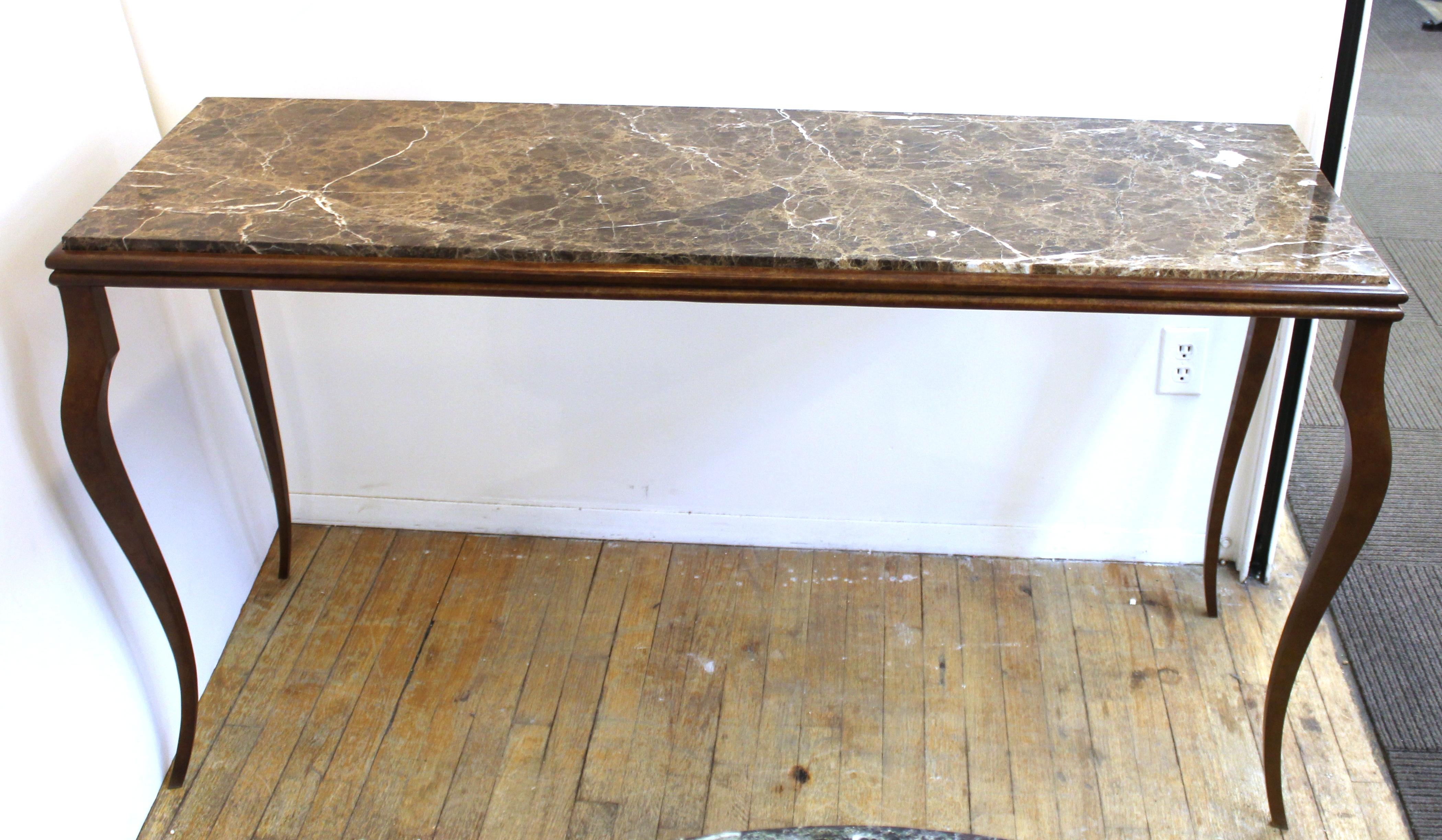 Modern console table with bronze structure and cabriole legs, and a marble top. The piece is in great vintage condition with age-appropriate wear.