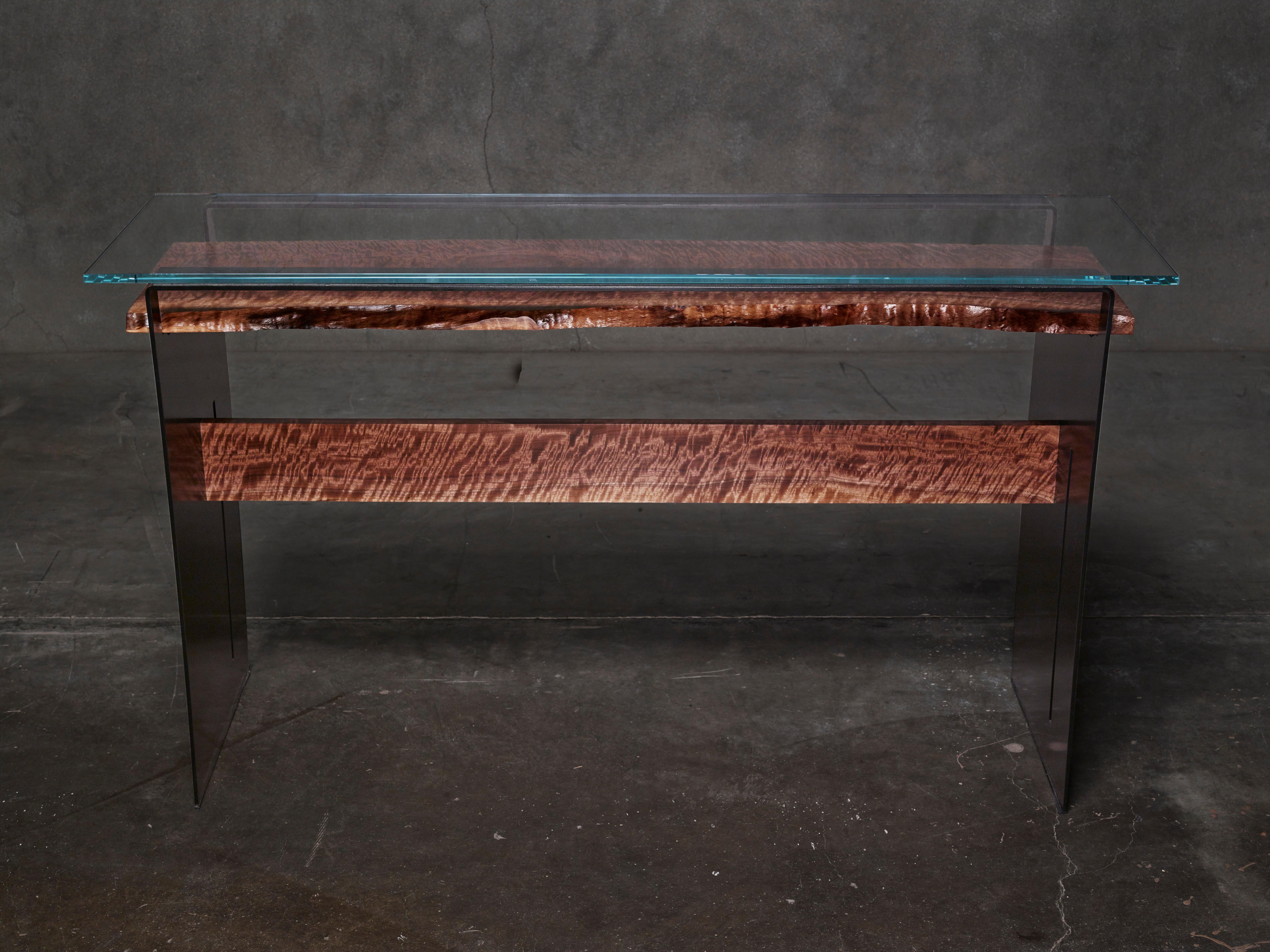 Tiger table is conceived, designed and created by award-winning artist and architectural designer Michael Olshefski of Primal Modern. It is inspired by both complexity and simplicity in nature, and Japanese origami. This modern console table