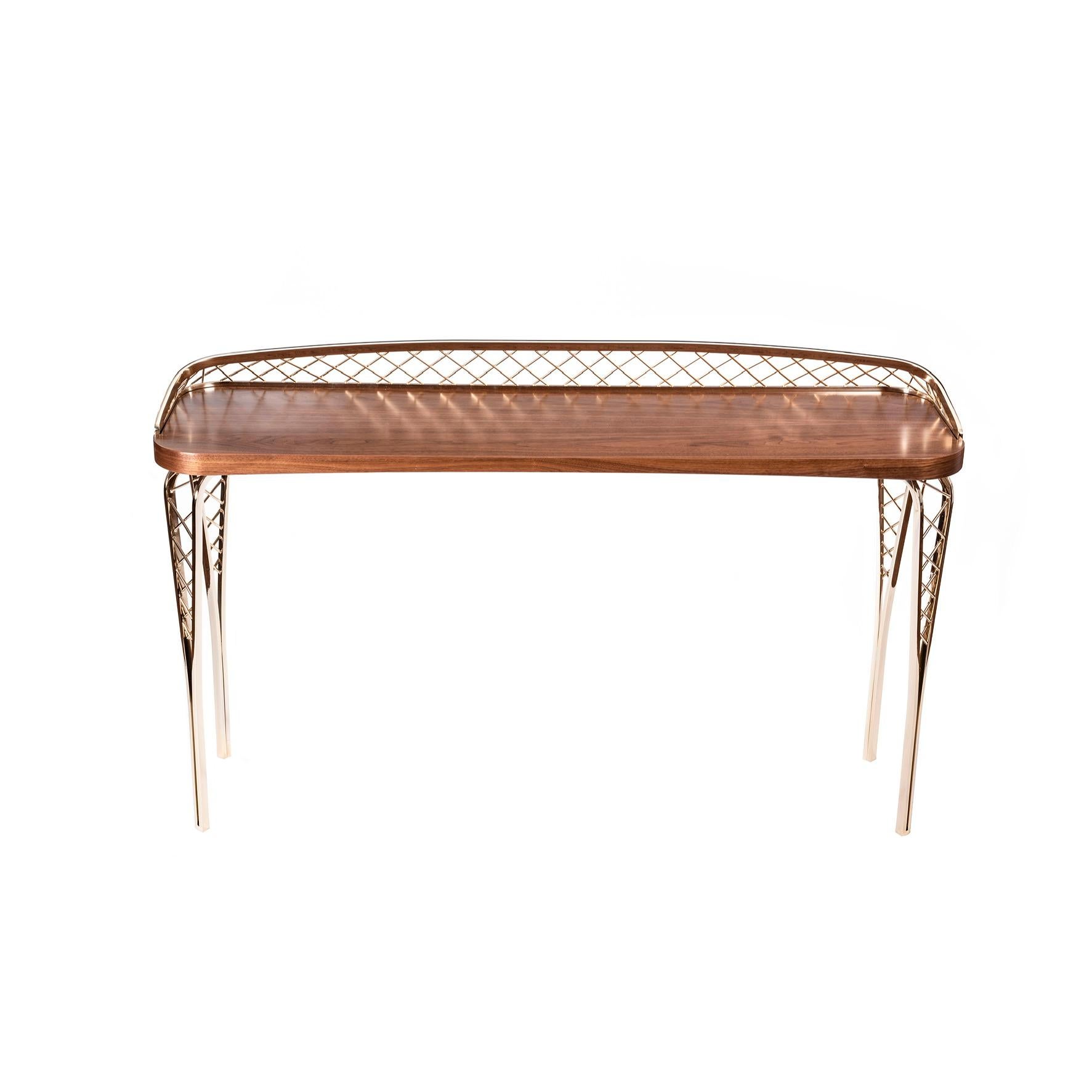 Modern console table Gustav made of wood and champagne stainless steel. The shape of the top and its variations in thickness combined with the metal mesh create an effect of lightness. The combination of straight transverse lines and curves and the